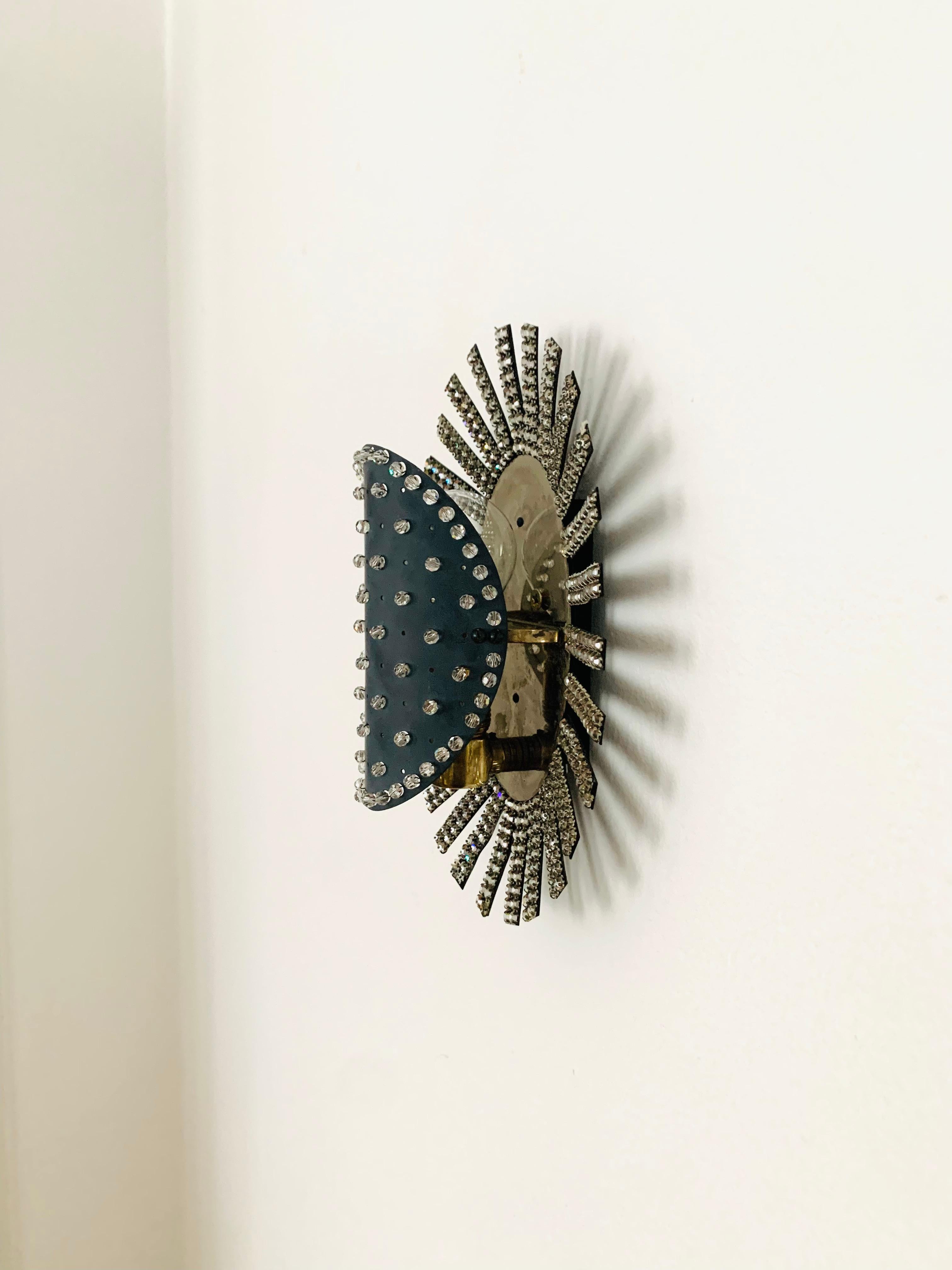 Metal Extraordinary Austrian Crystal Glass Sunburst Wall Lamp For Sale