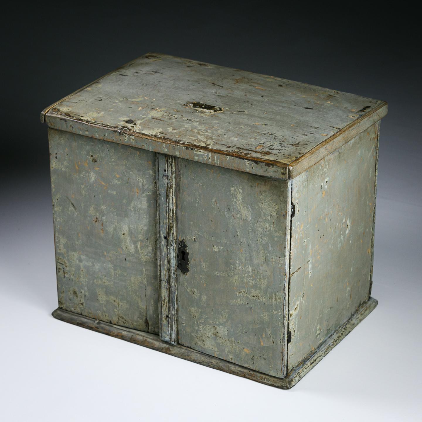 Extraordinary early 18th century Necessaire a Secrets, the exterior painstakingly dry scraped back to the original painted finish. the interior each drawer individually painted with charming naive scene. A further secret compartment found beyond the