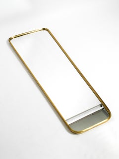 Extraordinary Heavy Mid Century Brass Wall Mirror by Vereinigte Werkstätten