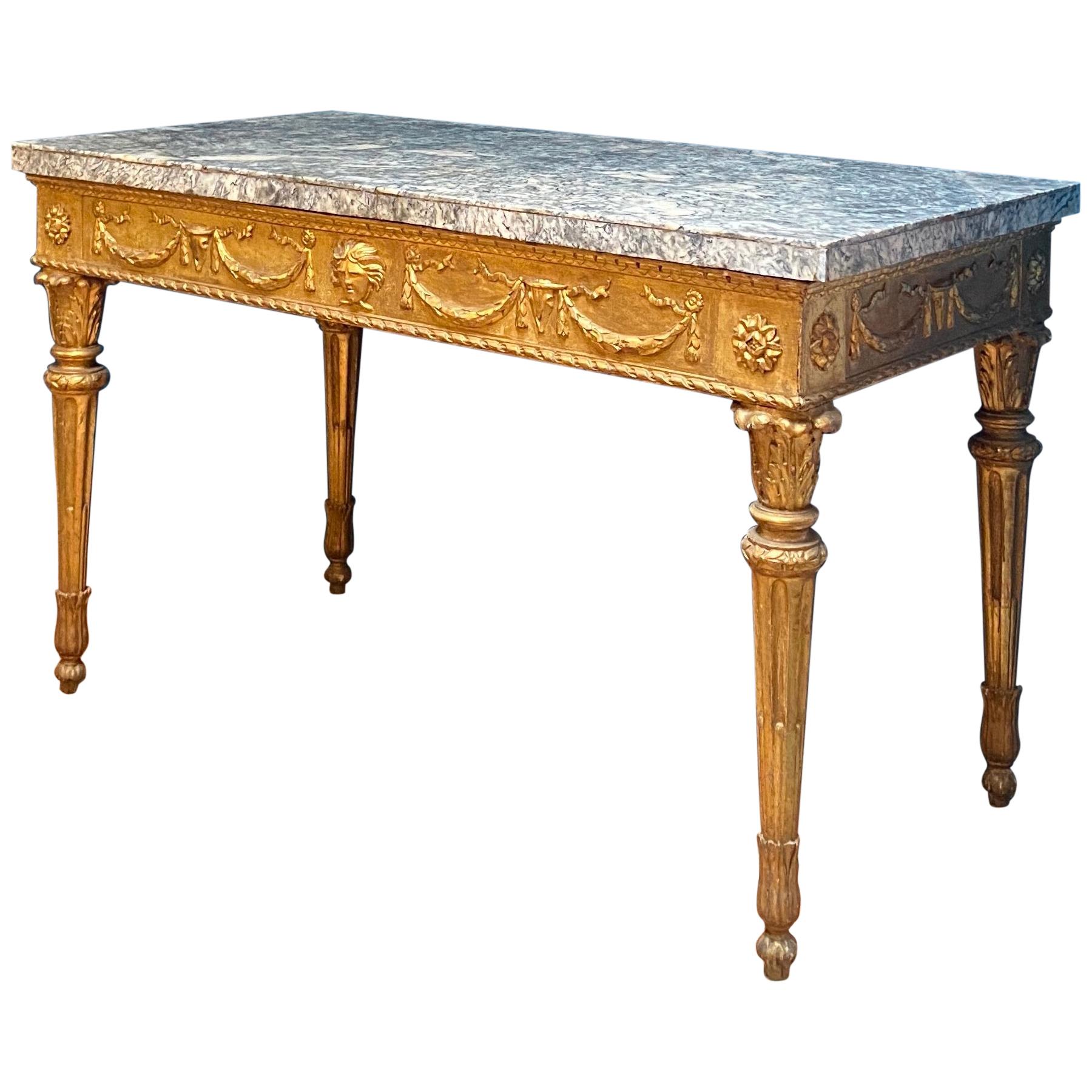 Extraordinaire table console italienne du 18ème siècle en bois doré sculpté