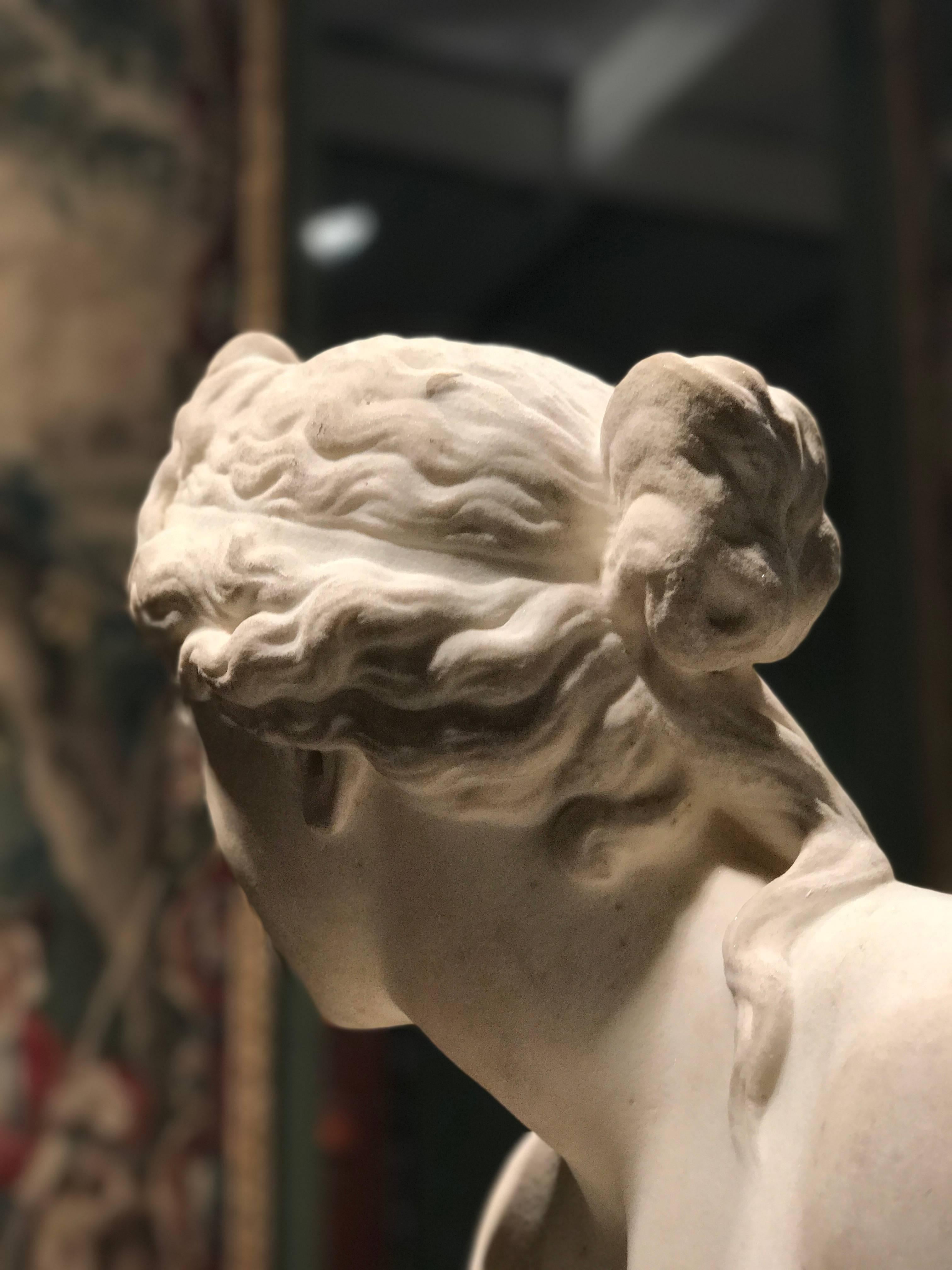 aphrodite statue sitting