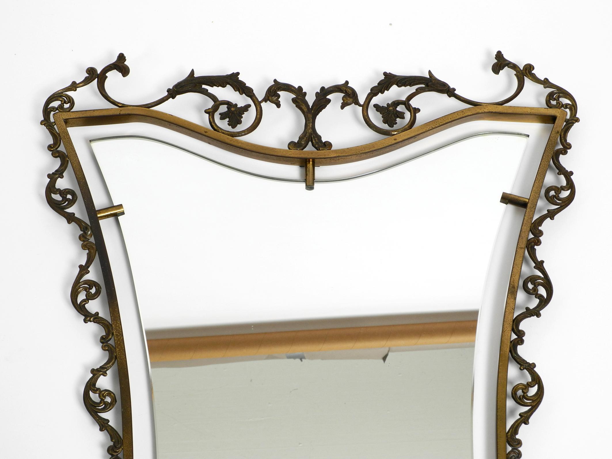 Extraordinary Large, Heavy Italian Mid Century Wall Mirror with an Ornate Brass In Good Condition For Sale In München, DE