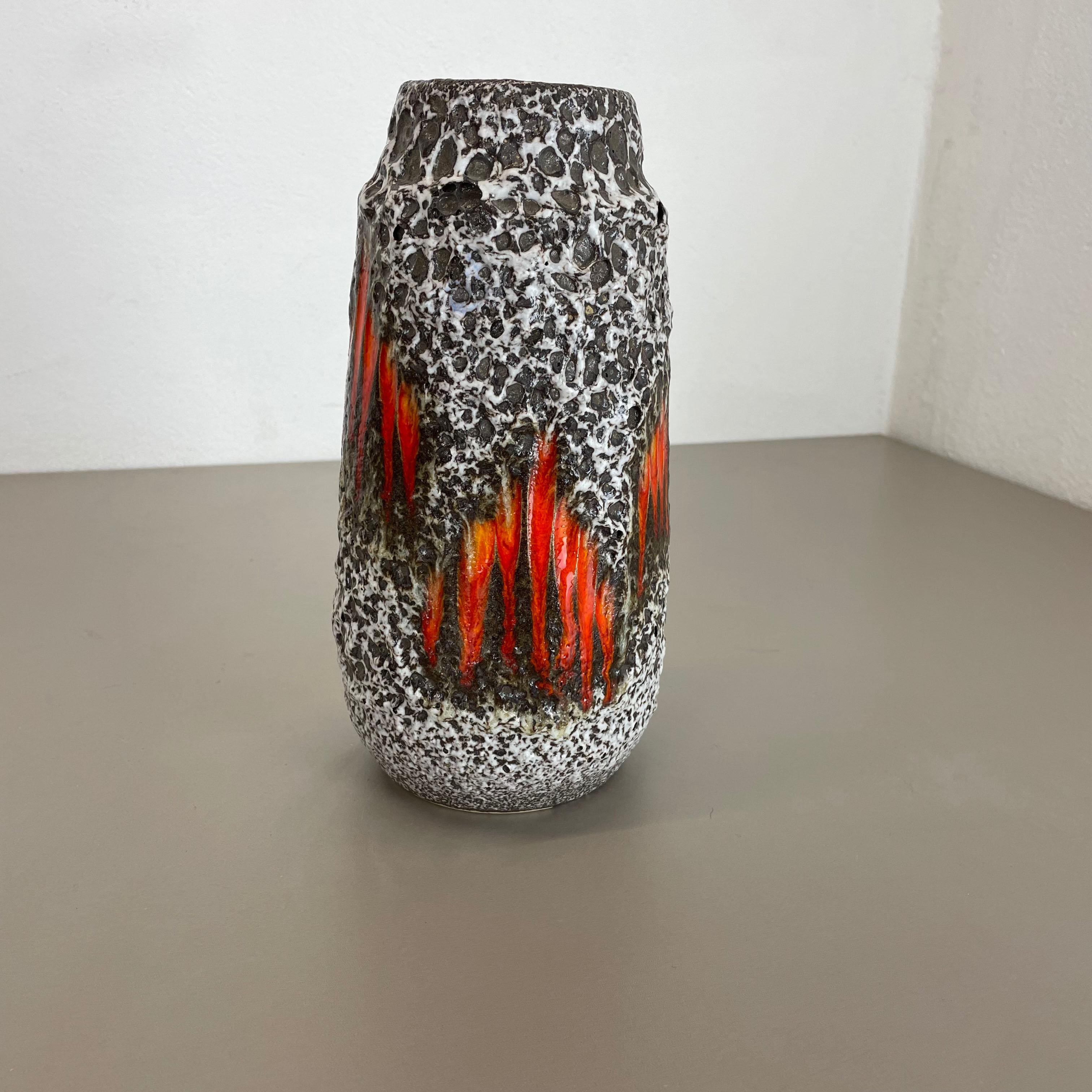 Article:

Fat lava art vase super rare black white red LORA DECOR.



Producer:

Scheurich, Germany



Decade:

1970s




This original vintage vase was produced in the 1970s in Germany by Scheurich. It is made of ceramic pottery