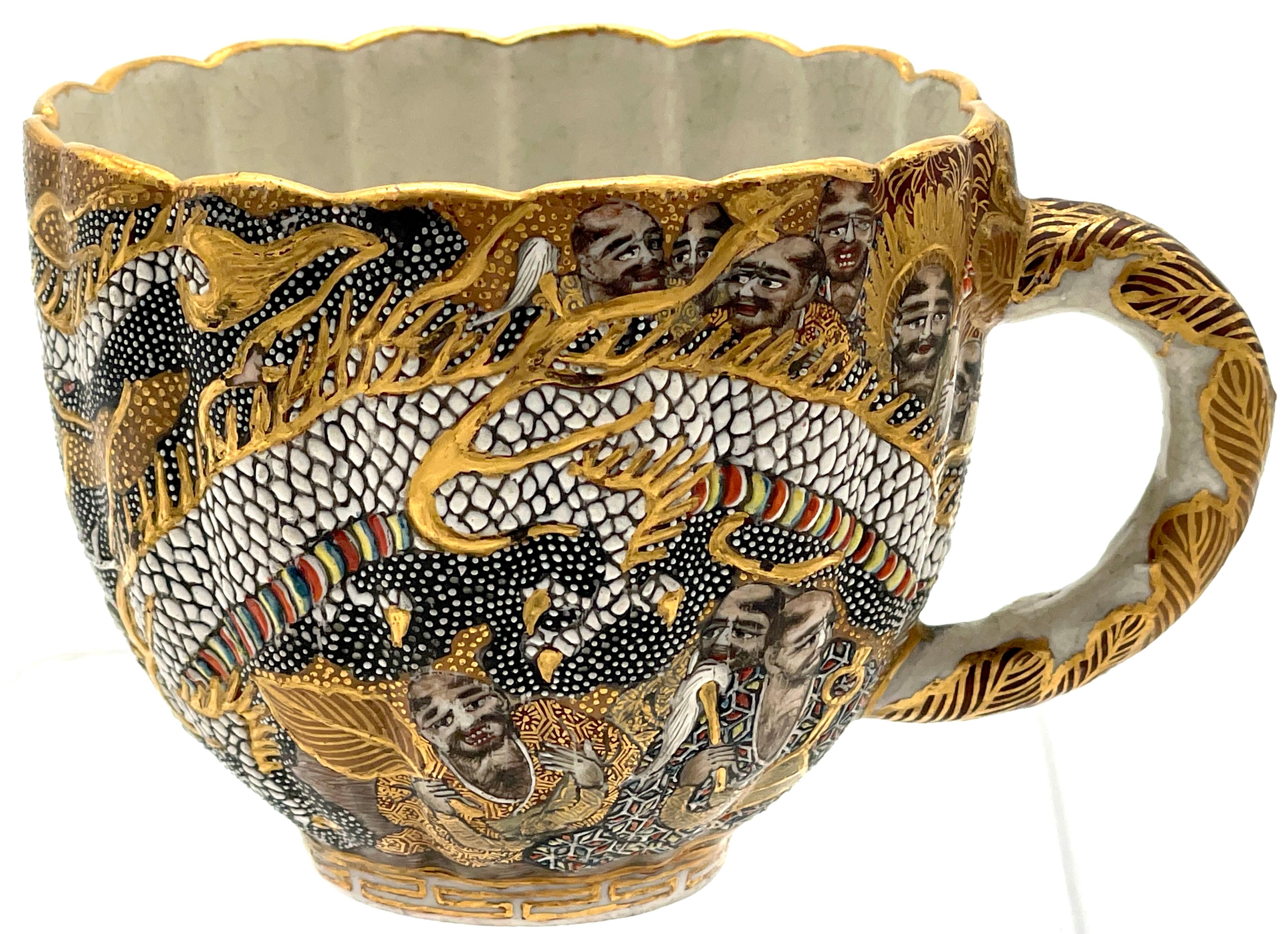 Extraordinary Meiji Satsuma Cup & Saucer, Raised Gilt Enamel Signature, Kozan Zo In Good Condition For Sale In West Palm Beach, FL