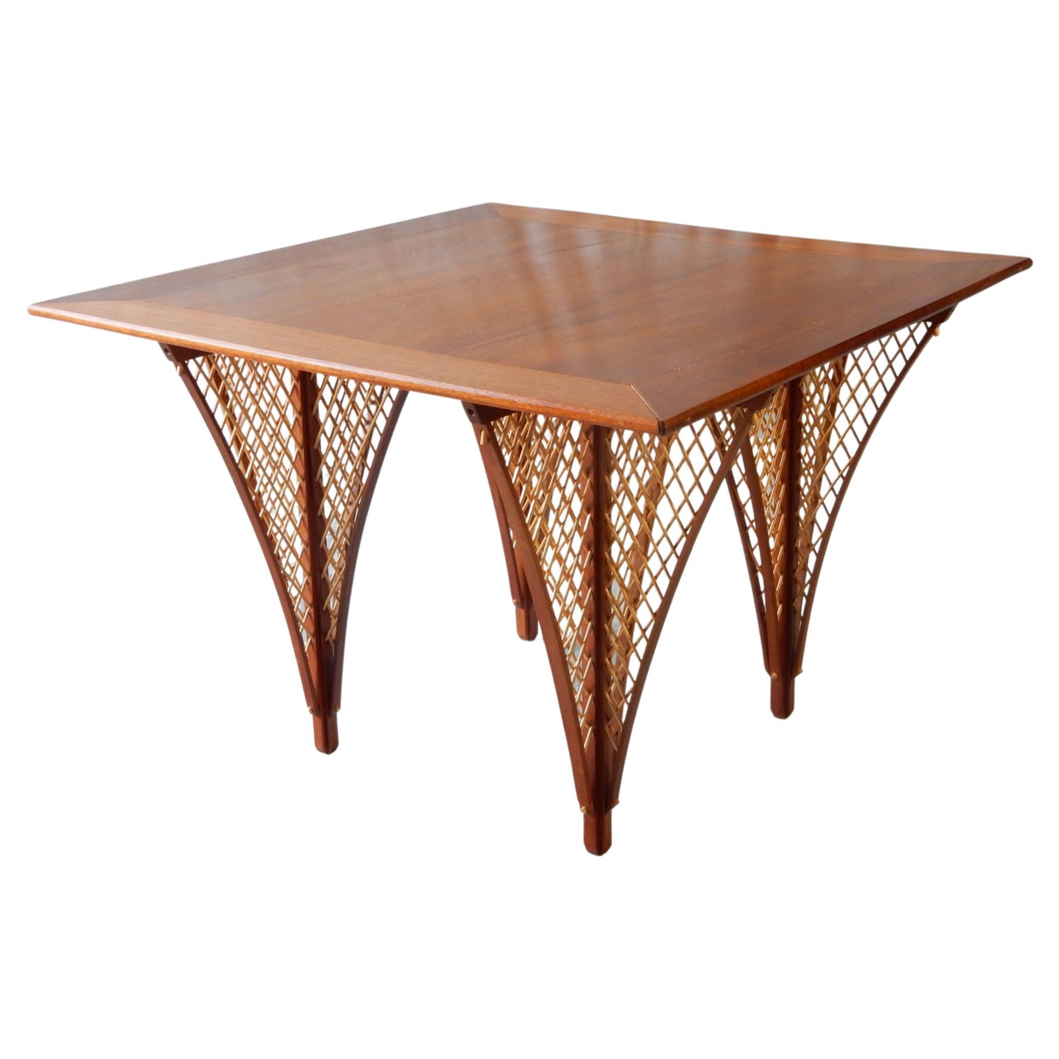 One of a kind and gorgeous architectural lattice Birch leg and Teak card table.
Circa 1960-70's. Solid, well crafted piece of functional art. Not signed or marked by designer.
Aged patina and dryness crack of table top (pictured). We left as is to