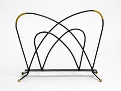 Extraordinary Mid Century Modern newspaper and magazine stand made of iron