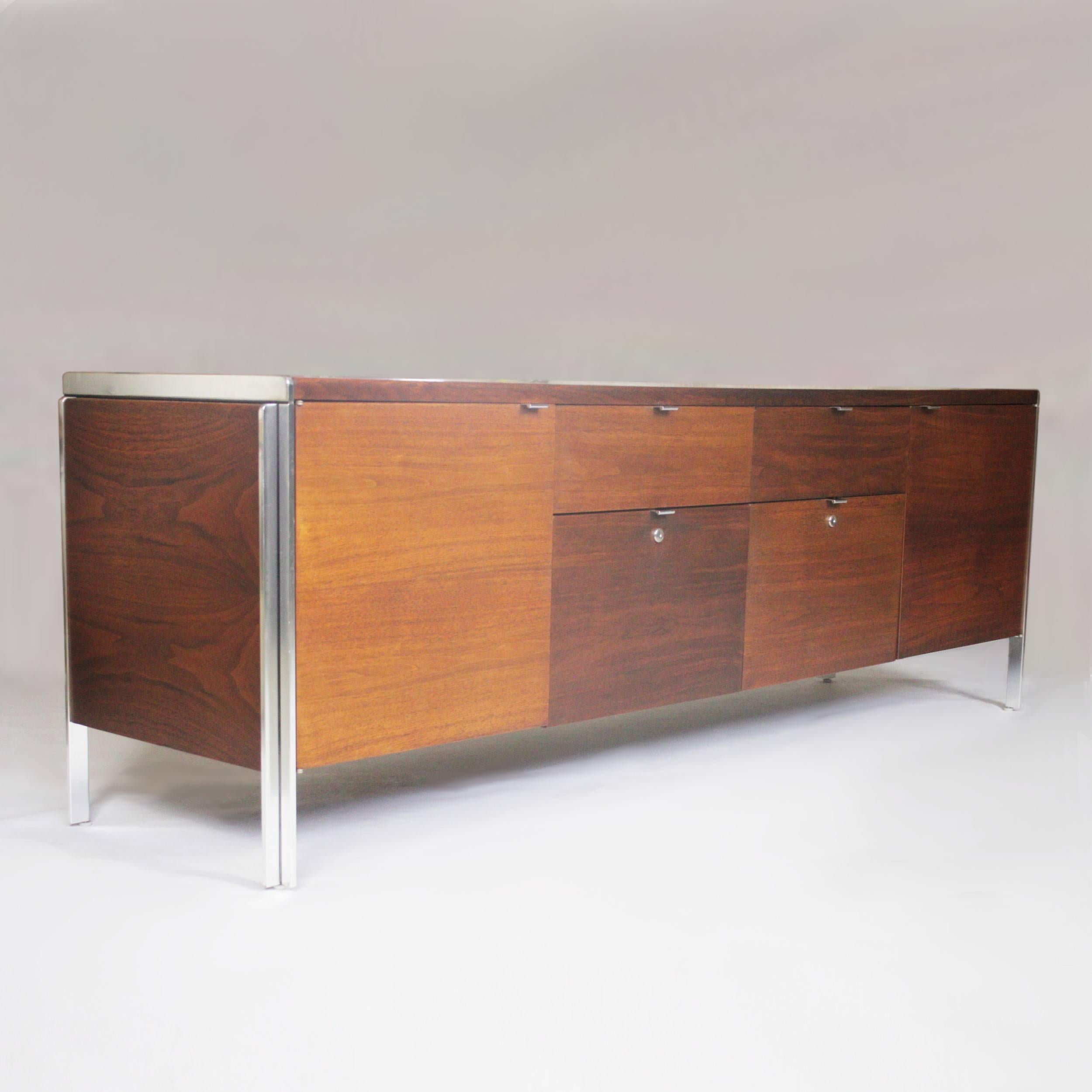 This wonderful Mid-Century Modern credenza by Stow Davis has everything going for it. With its beautifully clean lines and touch of chrome accents this credenza is the epitome of 1970s chic. At 79