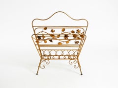 Extraordinary mid-century newspaper and magazine rack with a gilded metal frame