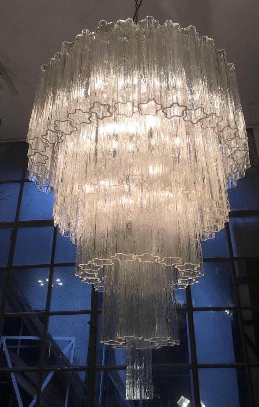 Extraordinary pair of chandeliers by Toni Zuccheri for Venini, 1960 from the Hotel in Dolomiti. Each chandelier is composed by 79 Tronch35 cm high 18 lights. Measure: 125 cm without chain!
Two pairs available.
With the same glasses are also