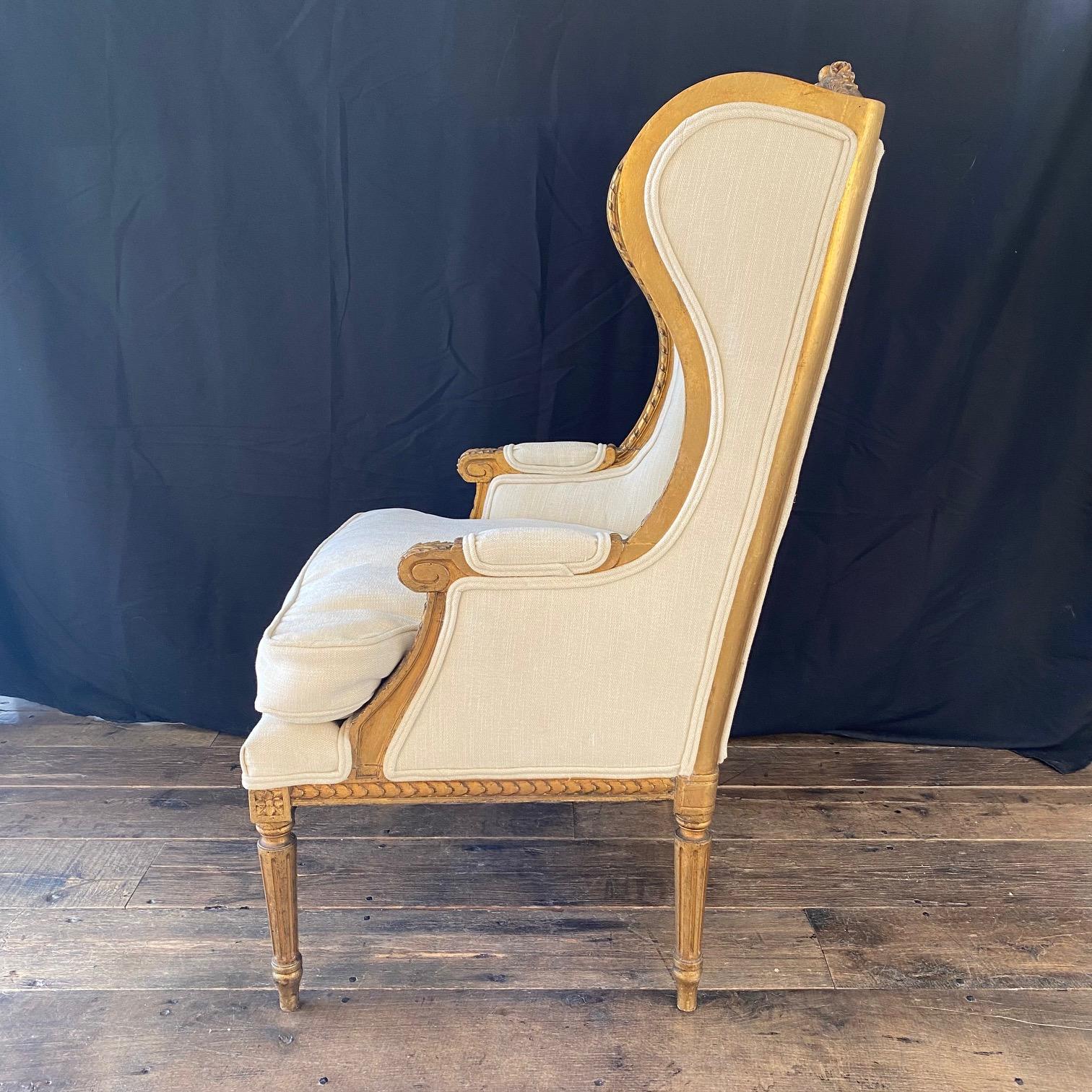 19th Century Extraordinary Pair of French Louis XVI Giltwood Wingback Armchairs or Bergeres For Sale