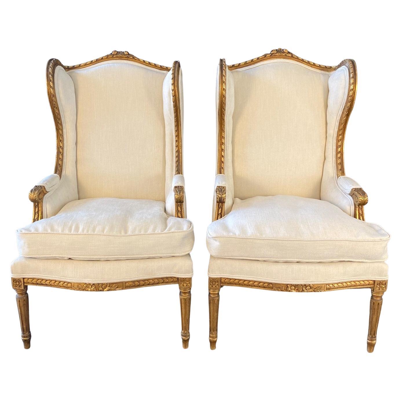 Extraordinary Pair of French Louis XVI Giltwood Wingback Armchairs or Bergeres For Sale