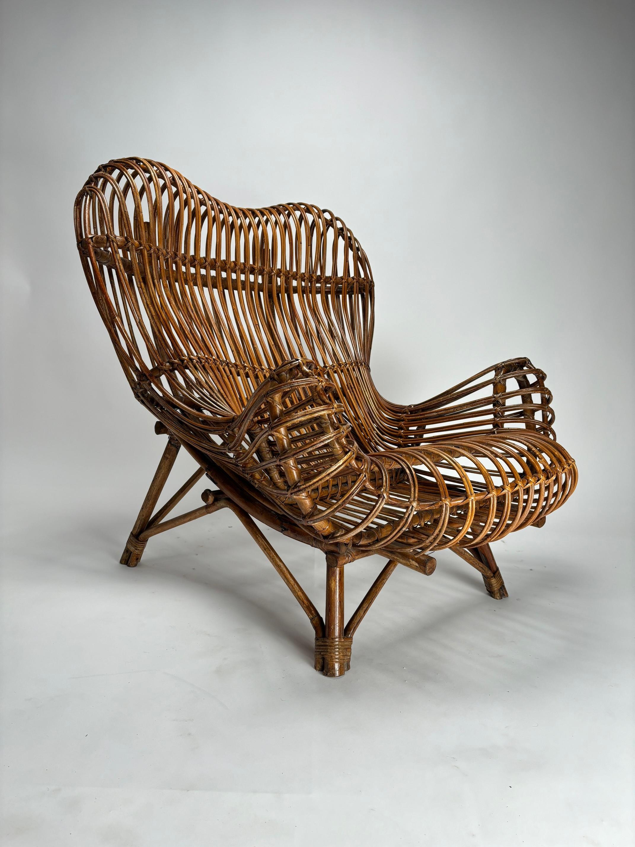 Dieses Sesselpaar ist ein ikonisches Zeugnis des italienischen Nachkriegsdesigns. Es wurde 1951 von dem berühmten Architekten und Designer Franco Albini entworfen und von der historischen Fabrik Vittorio Bonacina & C. hergestellt, die sich auf die