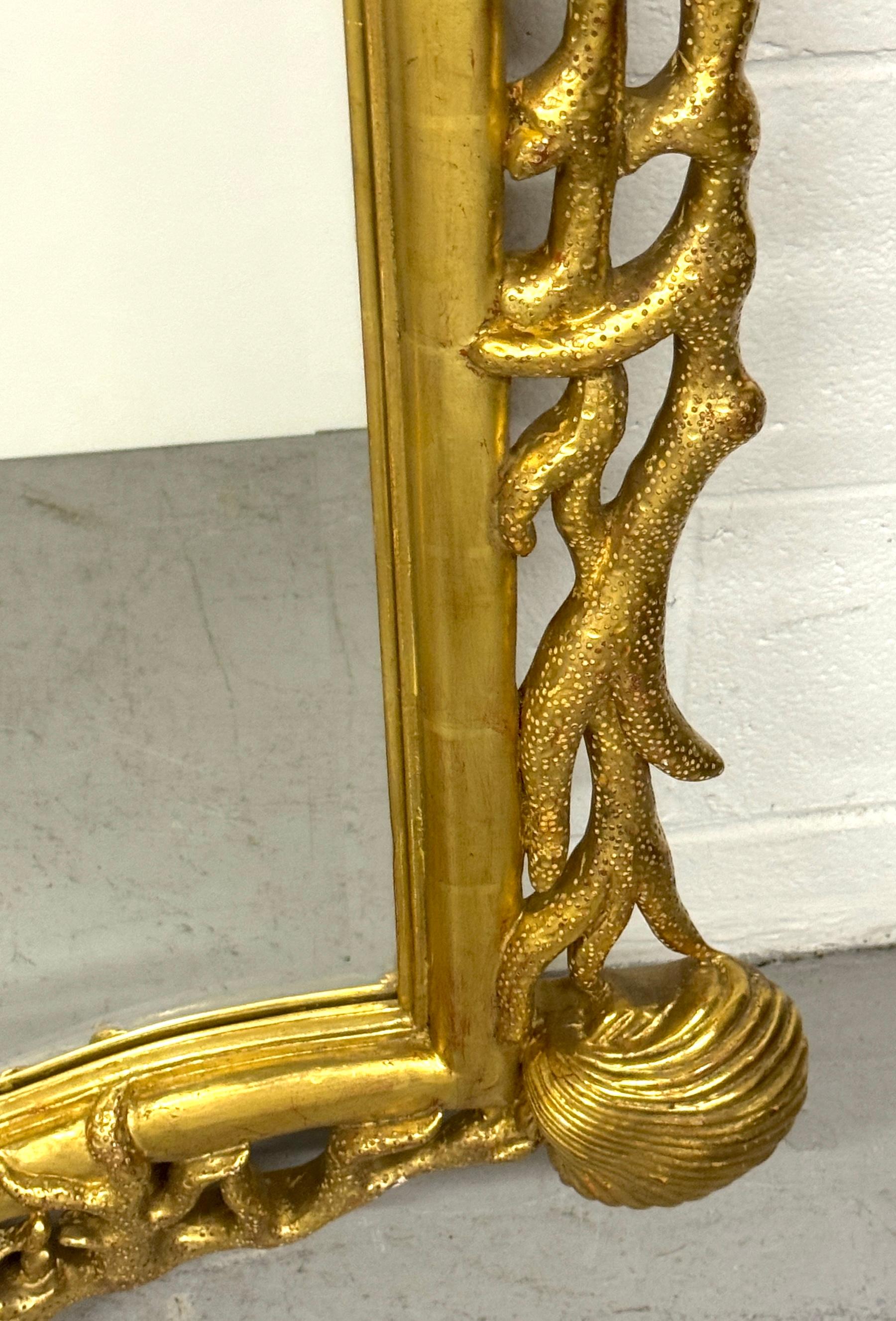 20th Century Extraordinary Pair of Italian Carved Giltwood Mirrors with Shell and Coral Motif For Sale