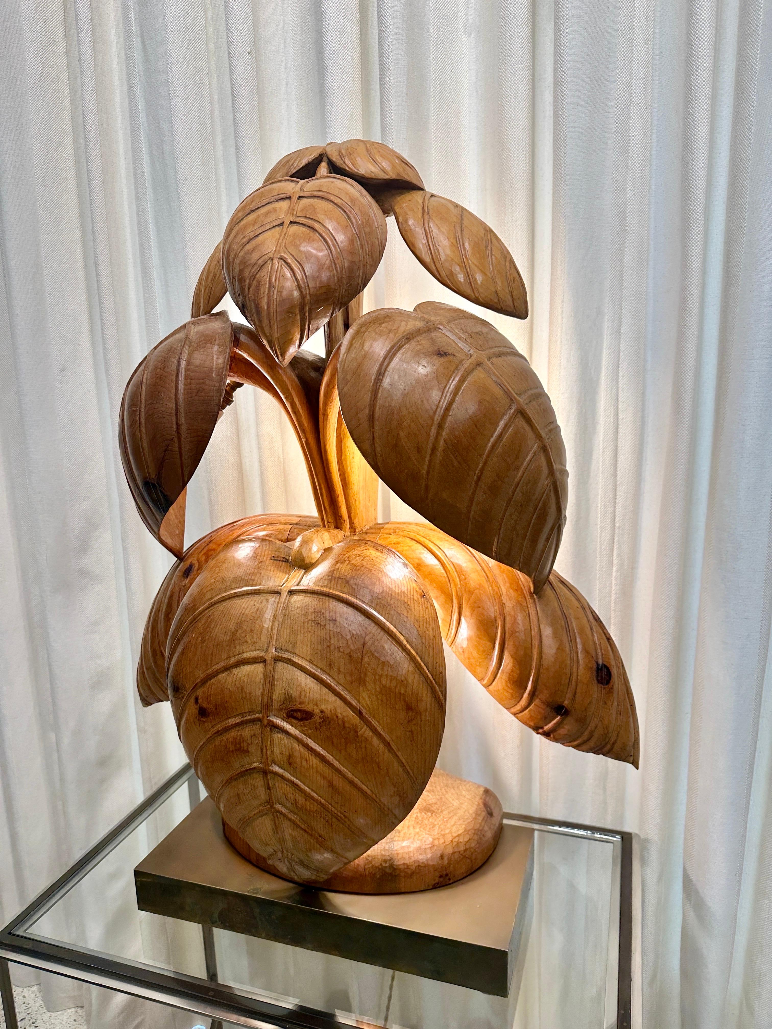 This oversized multi-tiered Rhubarb leaf sculptural lamp by famed woodworkers in Florence, Italy, Bartolozzi & Maioli.  It is hand carved out of knotty pine on brass base with new silk wiring.  THIS ITEM IS LOCATED AND WILL SHIP FROM OUR MIAMI,