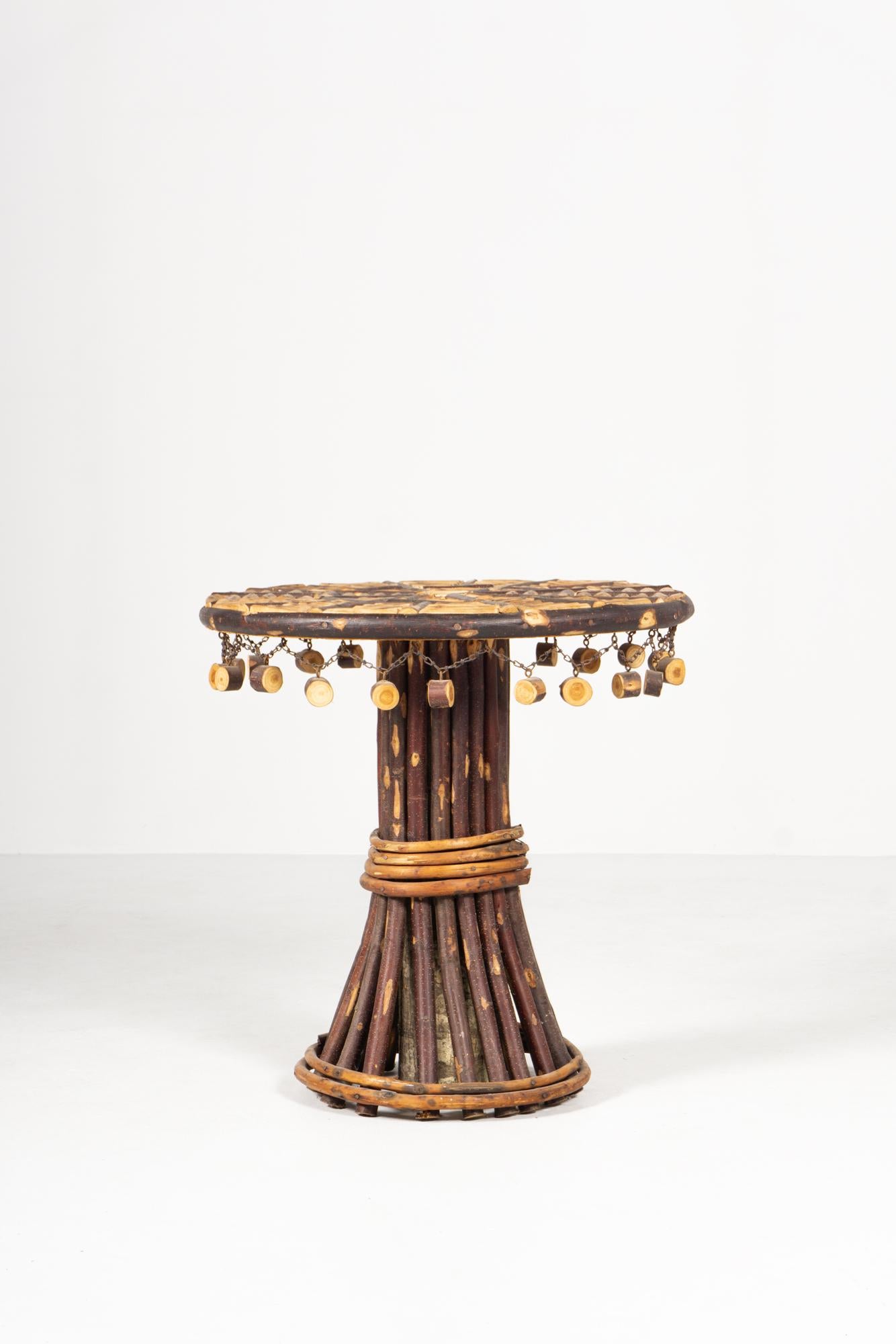 Side table, hickory (North American walnut), ash, hazelnut wood, steel
Design / Elizabeth Garouste + Mattia Bonetti 1992
ISBA Collection
Dimensions / H.58cm ø 59cm


+++
Designer Mattia Bonetti was born in Lugano, Switzerland, in 1952 and trained at