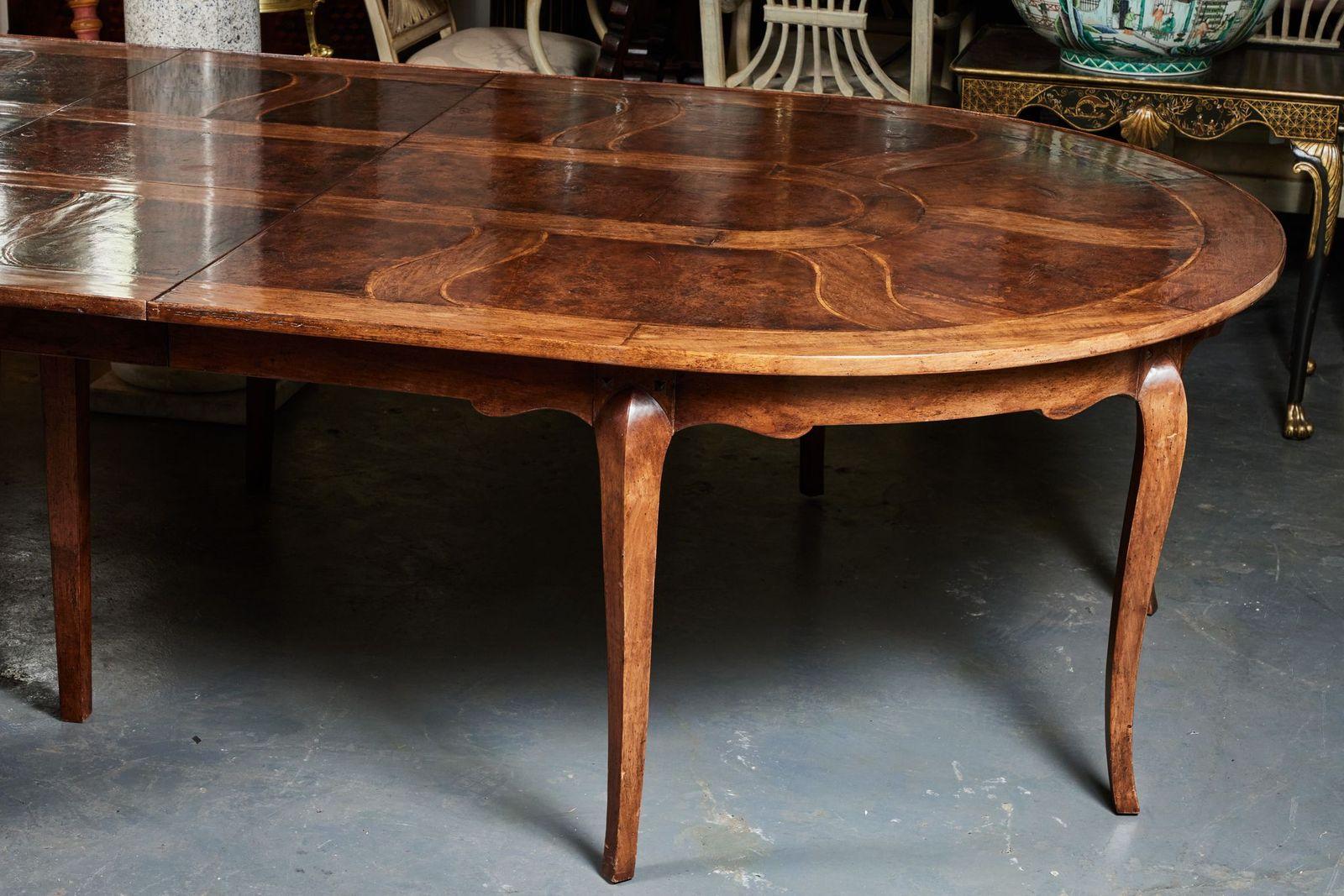 Carved Extraordinary, Six-Leaf Option Dining Table