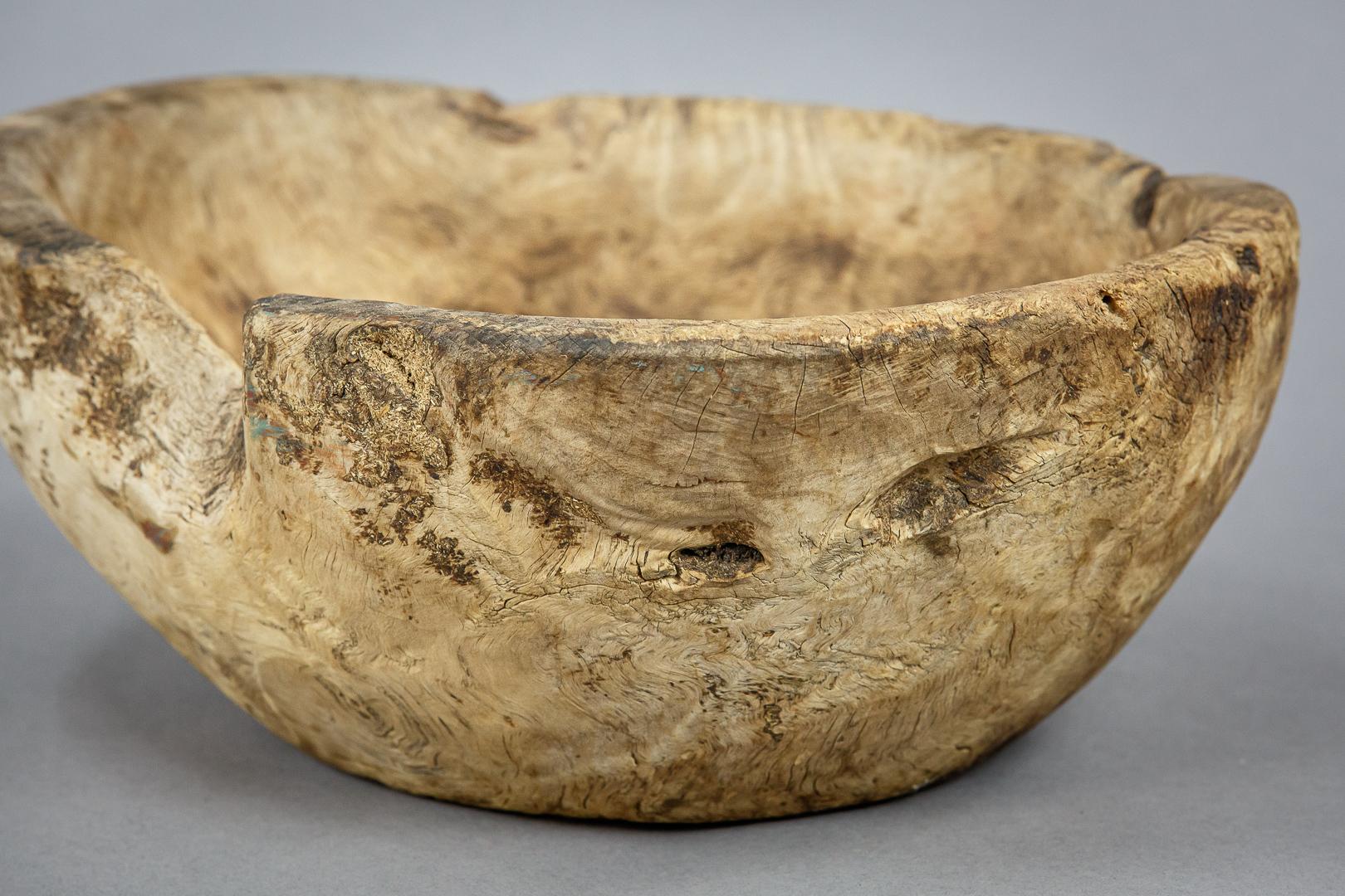 Extraordinary burl root or knot bowl, dry textured surface. Wonderful wear and patina, Northern Europe circa 1800.
Dimensions: 31cm x 13cm x 25cm.