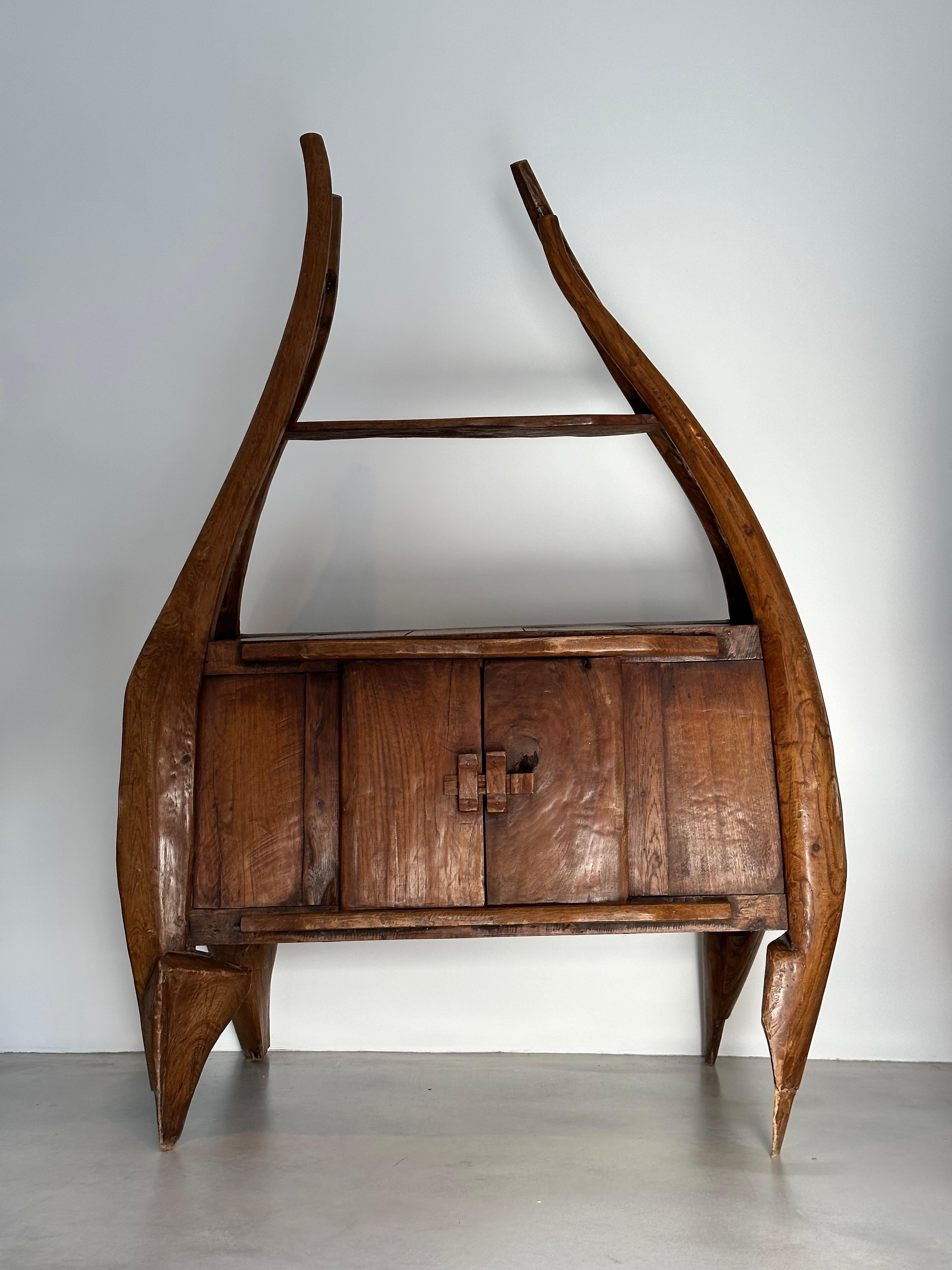 Spectacular primitive cabinet.

French work from the end of the 19th century.

Coming from the French Pyrenees, handmade by a folk art artist. This craftsman used certain elements of agricultural tools to mix them with scraps of wood.

The furniture