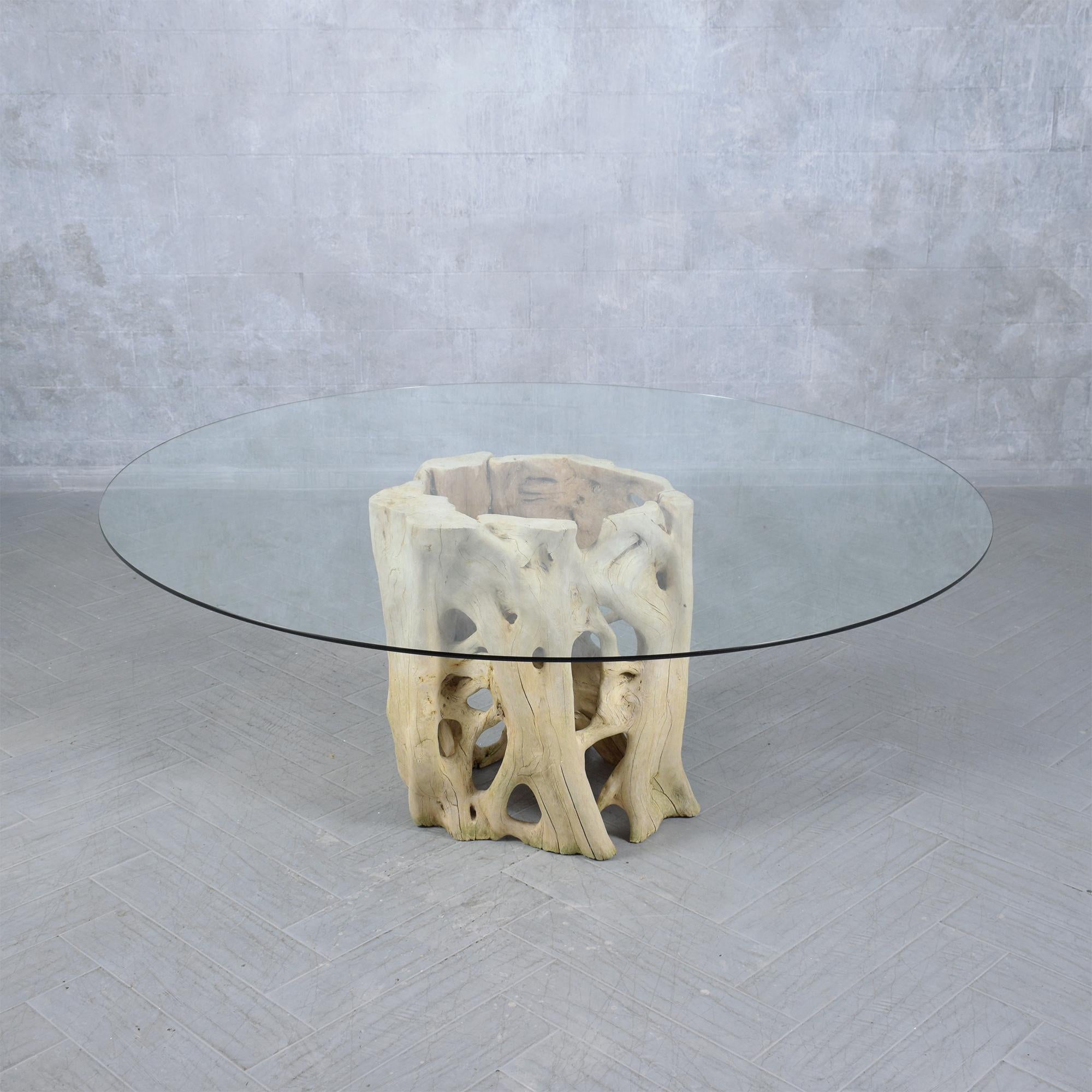 Immerse yourself in the unique beauty of nature combined with expert craftsmanship with our vintage root tree dining table. This one-of-a-kind piece is masterfully crafted from cypress wood, known for its durability and distinctive grain. The table