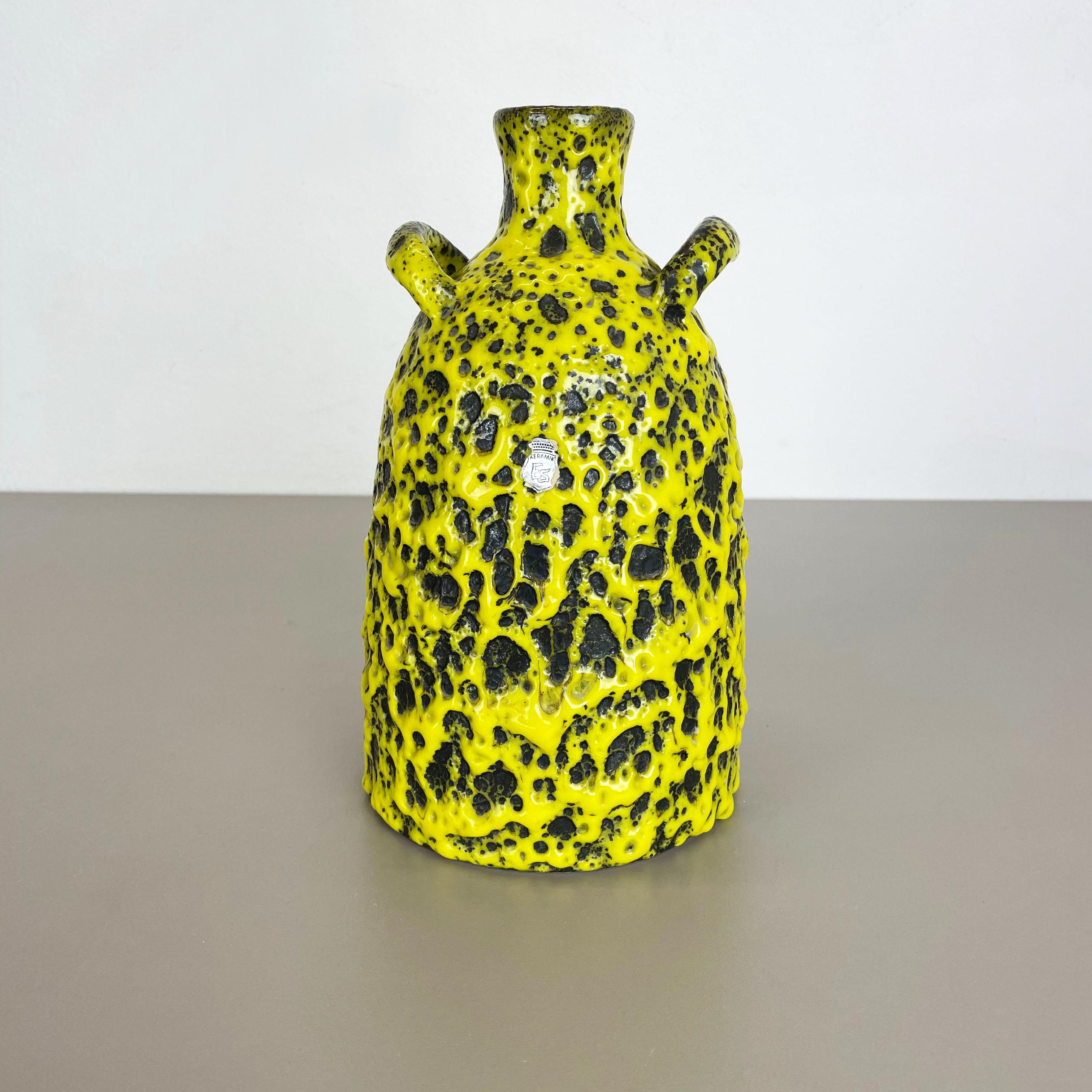 Article:

Fat lava art vase 


Producer:

ES Ceramics, Germany (see label)


Decade:

1970s


Description:

This original vintage vase was produced in the 1970s in Germany by premium vase producer ES Keramik. it is made of ceramic