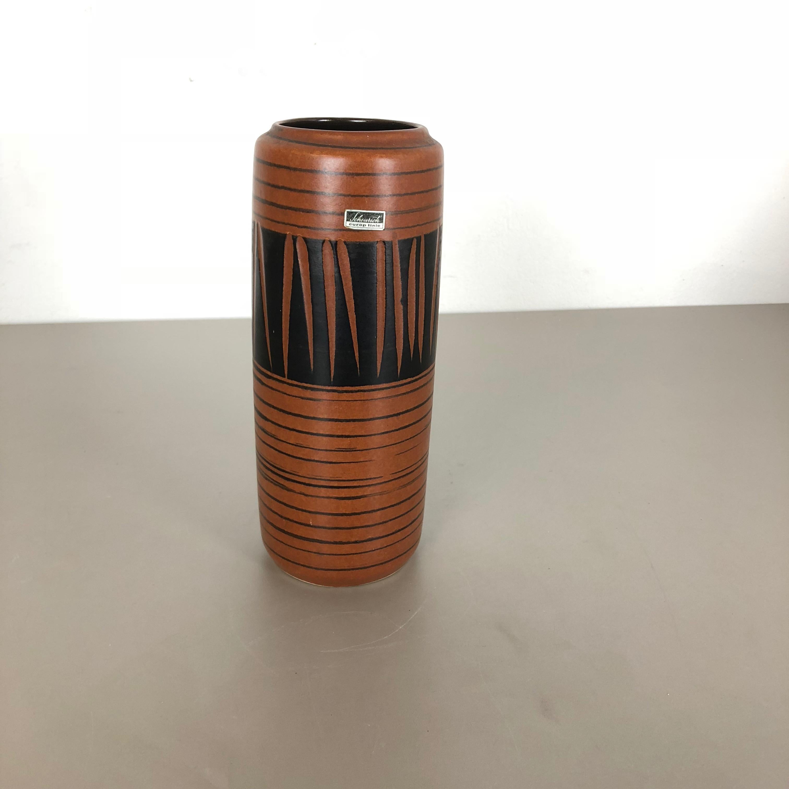 Article:

Fat lava art vase super rare brown coloration and pattern


Model: 532-28


Producer:

Scheurich, Germany



Decade:

1970s


This original vintage vase was produced in the 1970s in Germany by Scheurich. It is made of
