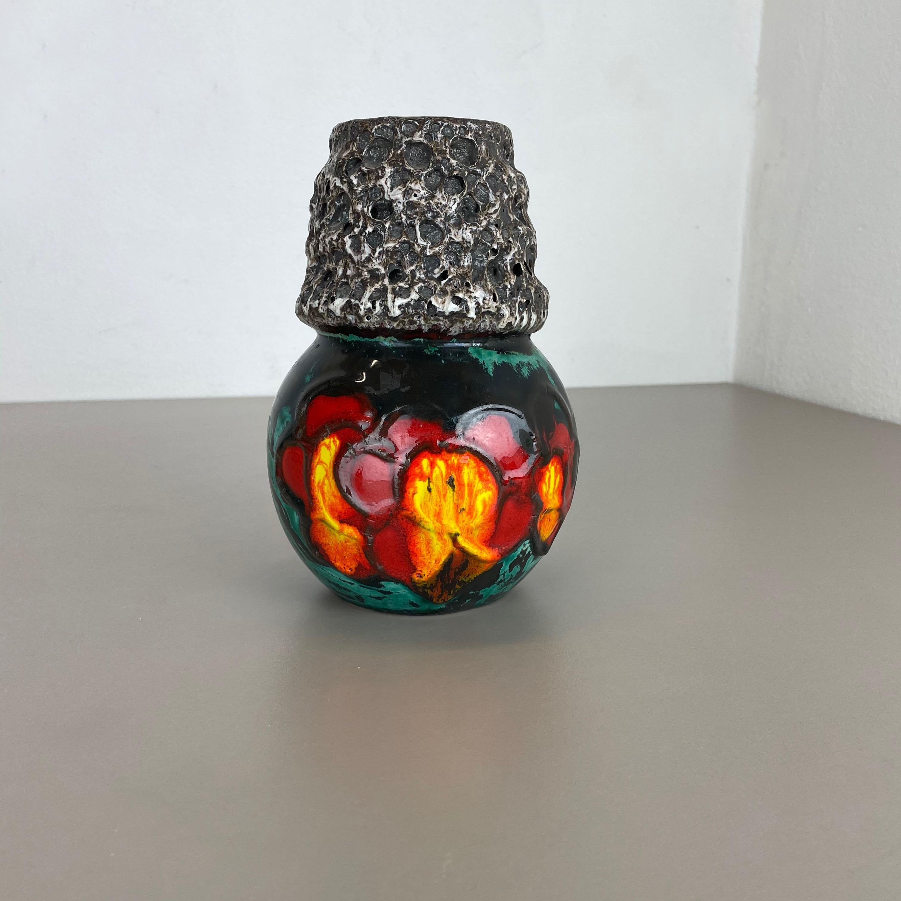 Article:

Fat lava art vase super rare yellow, red, green, black coloration


model: 269-22


Producer:

Scheurich, Germany



Decade:

1970s


Description:

This original vintage vase was produced in the 1970s in Germany by