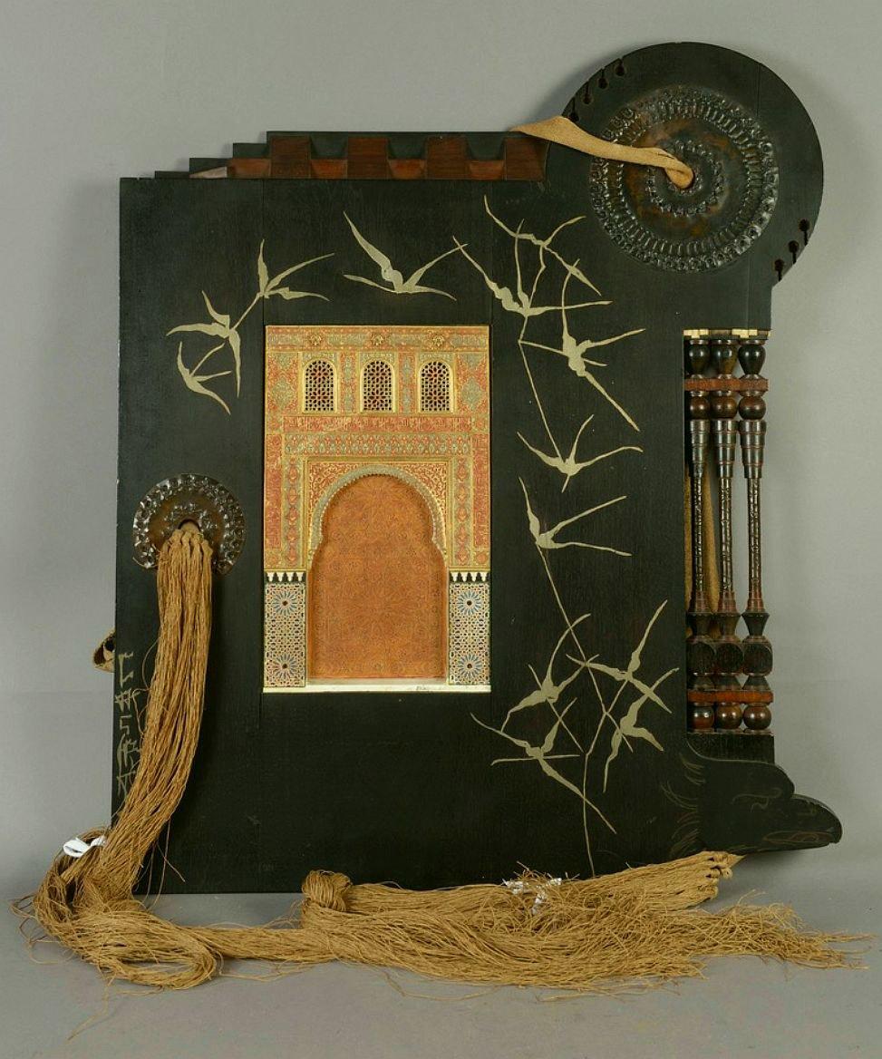 Extraordinary wall panel by Carlo Bugatti with an architectural relief by Enrique Linares (Granada since around 1870). Blackened wood and walnut, with inlays and ornamented applications in copper leaf. Asymmetrical panel with columns and