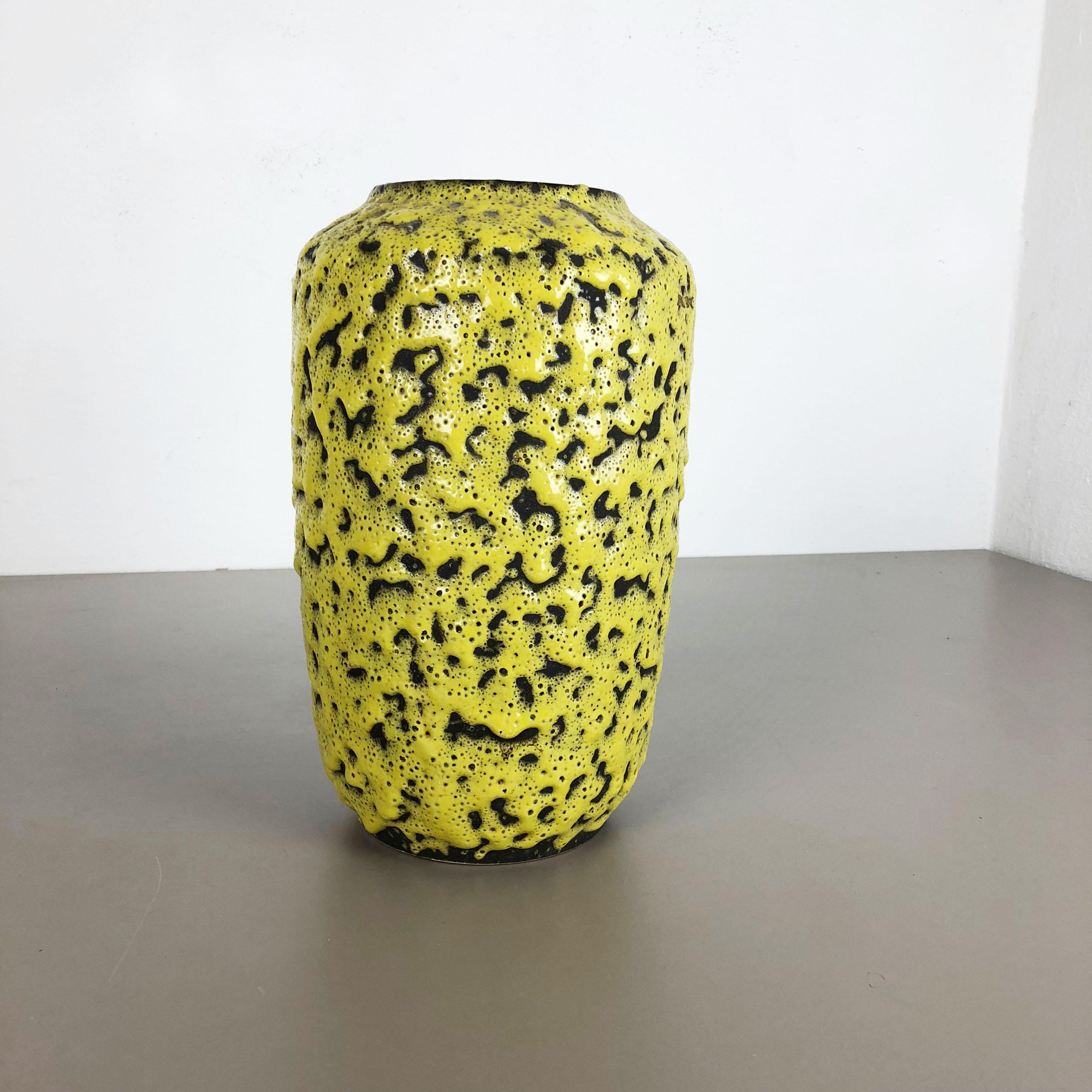 Article:

Fat lava art vase super rare yellow and black glazed coloration


Producer:

Scheurich, Germany



Decade:

1970s


Description:

This original vintage fat lava vase was produced in the 1970s in Germany by Scheurich. it