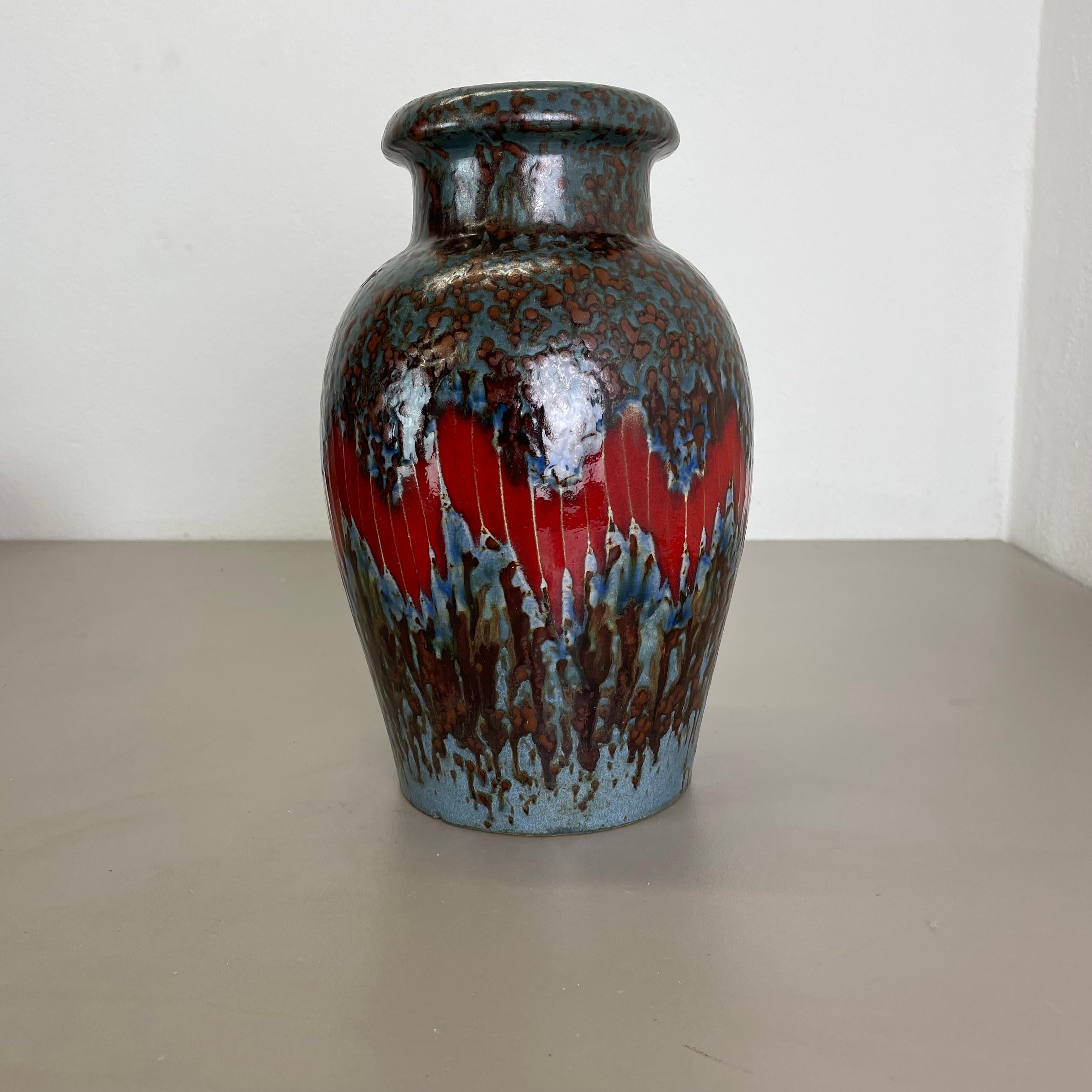 Article:

Fat lava art vase super rare LORA DECOR.



Producer:

Scheurich, Germany



Decade:

1970s




This original vintage vase was produced in the 1970s in Germany by Scheurich. It is made of ceramic pottery in fat lava optic. Super rare in