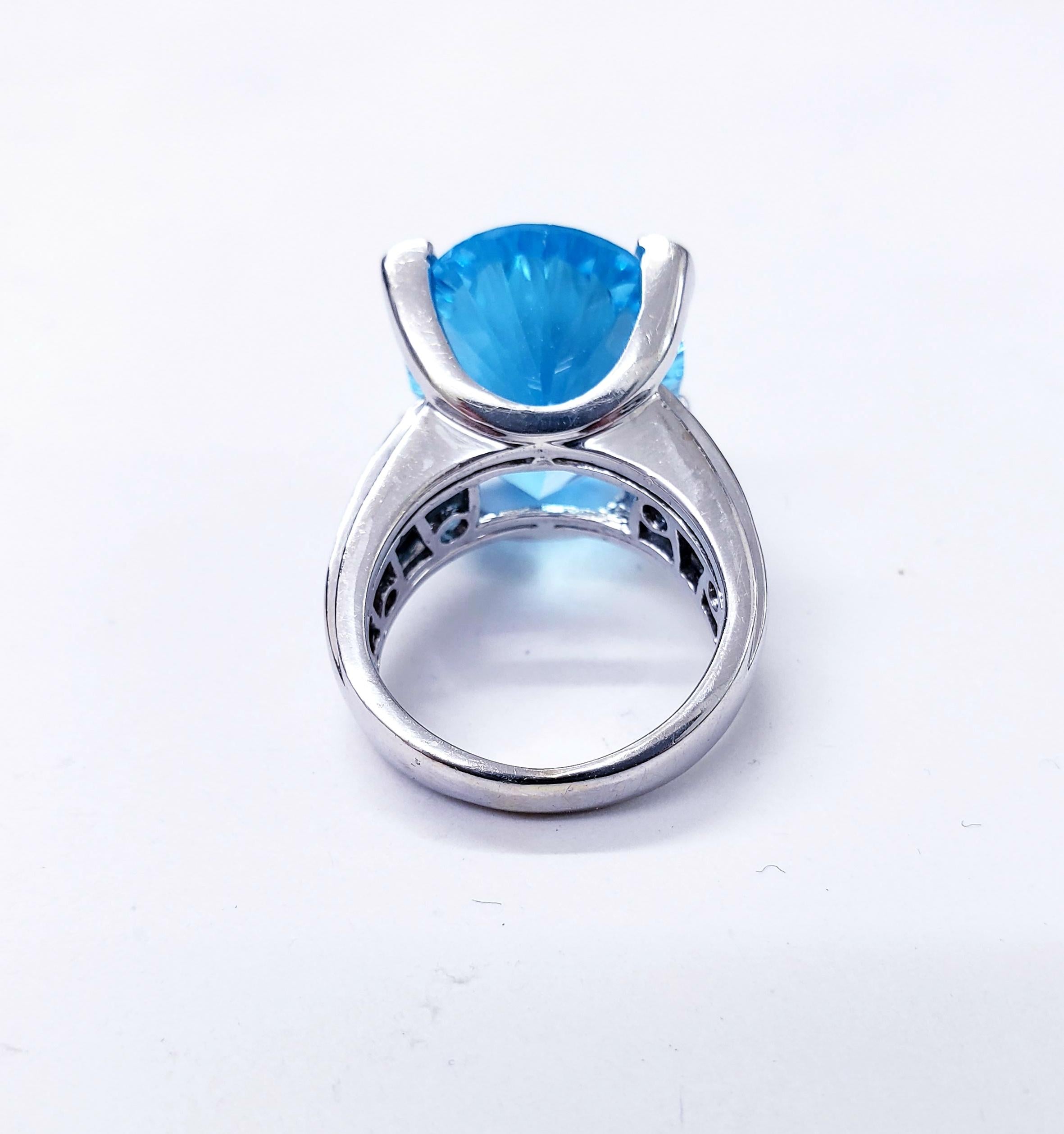 Oval Cut Extravagant 17.00 Carat Concave Oval Blue Topaz Diamond Cocktail Ring 18k White For Sale