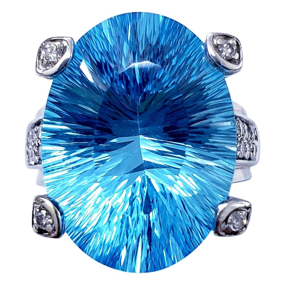 Extravagant 17.00 Carat Concave Oval Blue Topaz Diamond Cocktail Ring 18k White For Sale