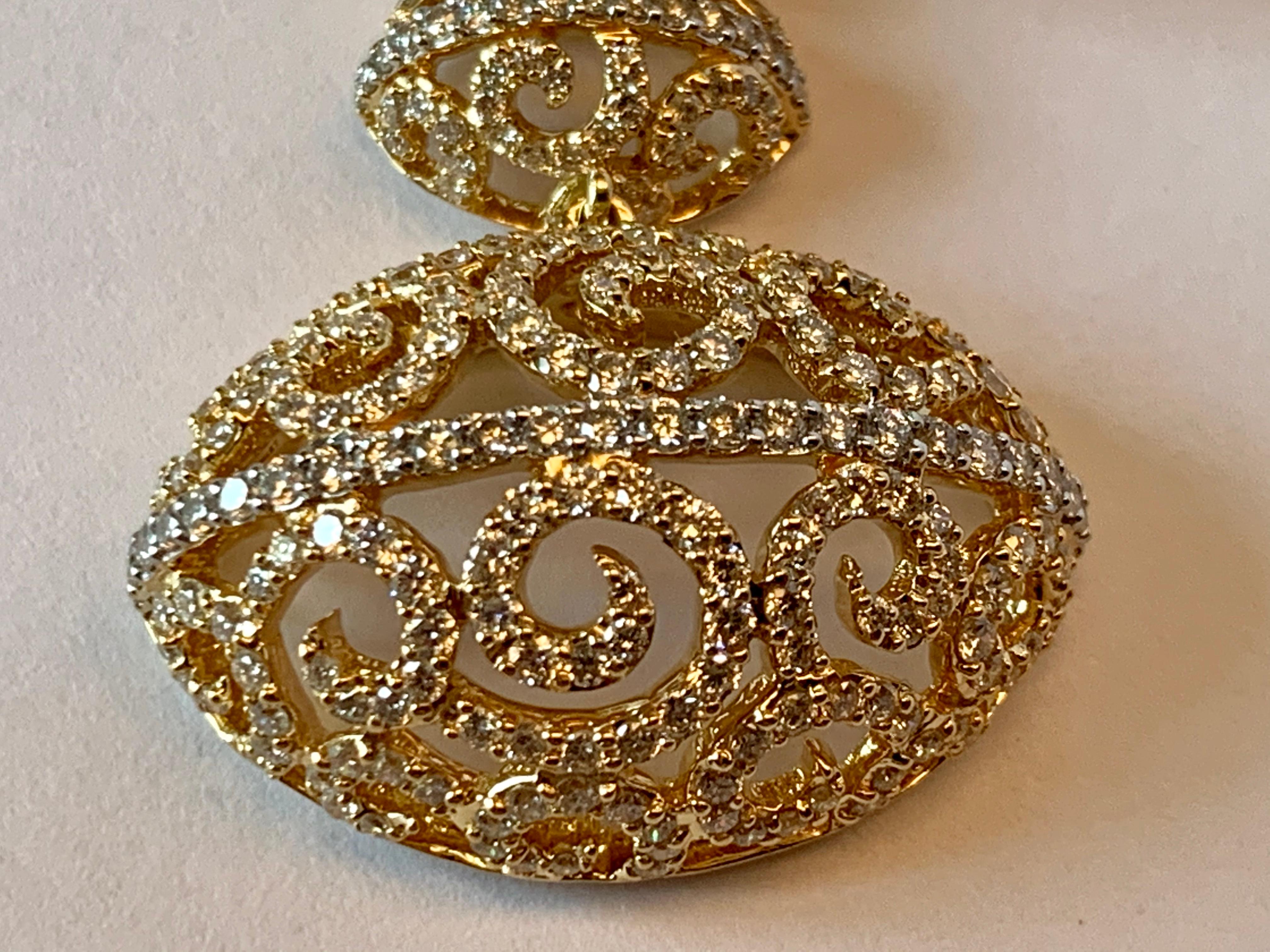 Contemporary Extravagant and Intricate 18 Karat Yellow Gold Earrings with Diamonds For Sale