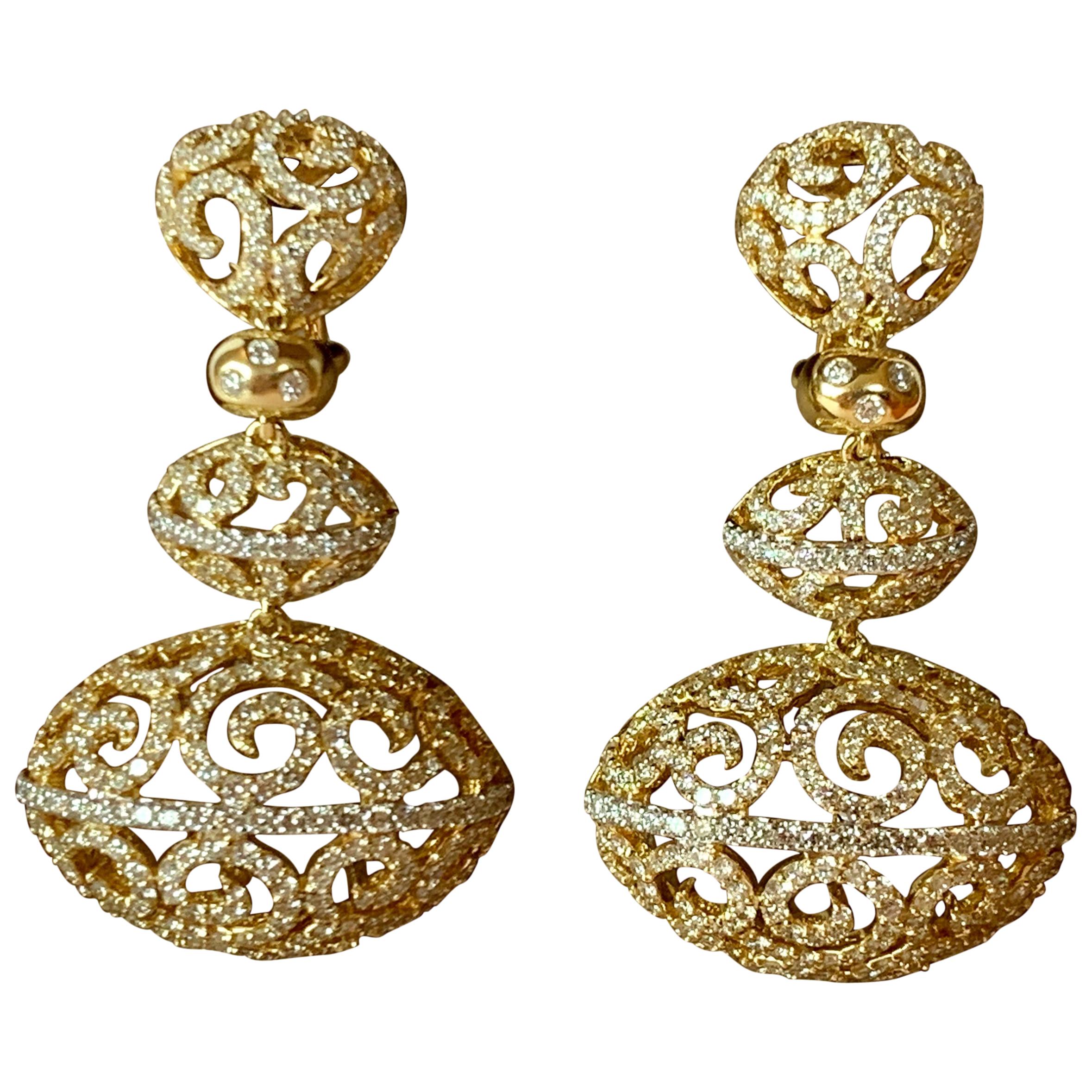 Extravagant and Intricate 18 Karat Yellow Gold Earrings with Diamonds For Sale