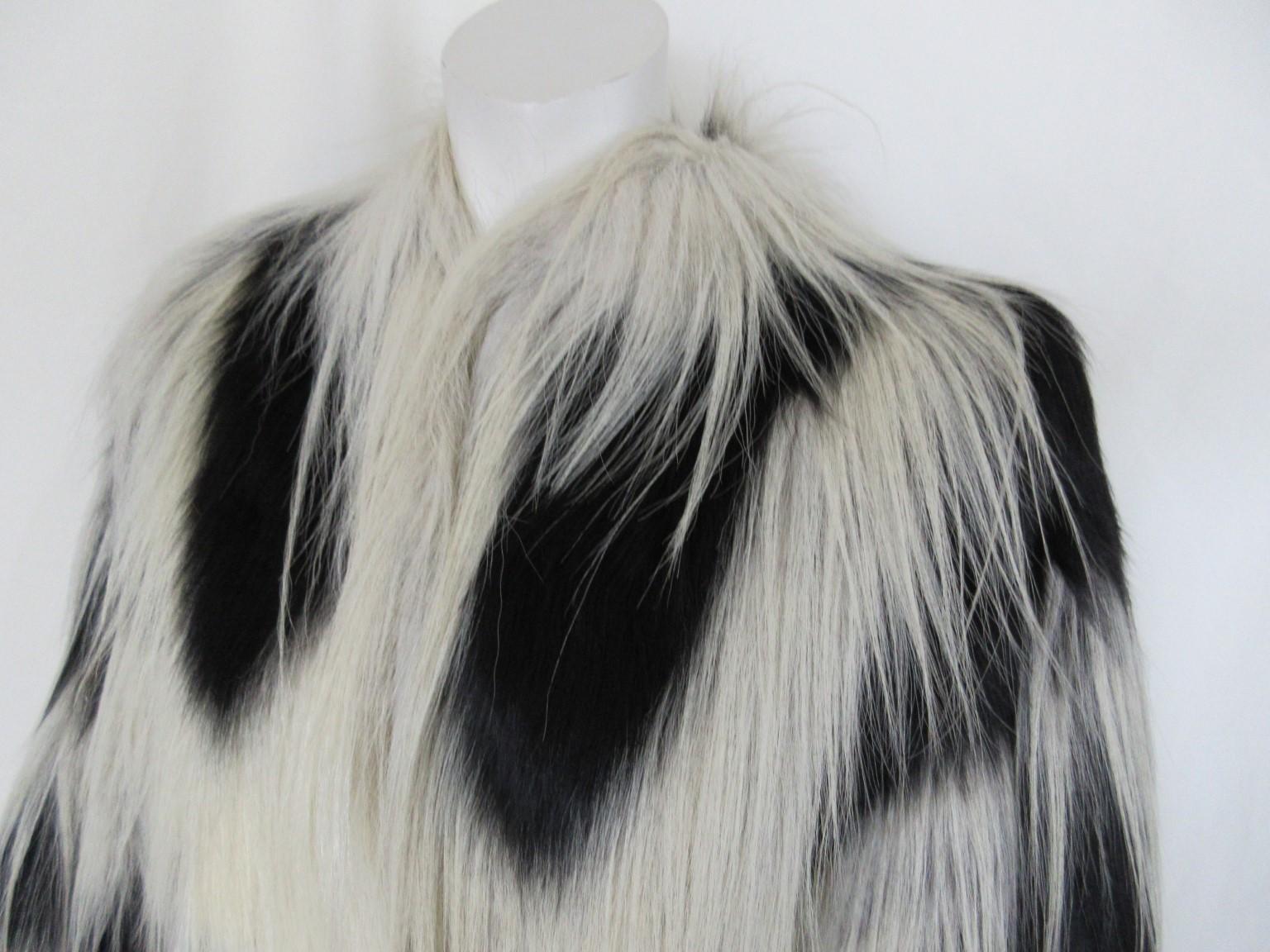 Vintage yak fur cape designed by Claude Litz, Paris

We offer more exclusive vintage items, view our frontstore

Details:
Black lining
2 pockets
Side leather closing straps
3 closing hooks
Can be worn by men or women /unisex

Please note that