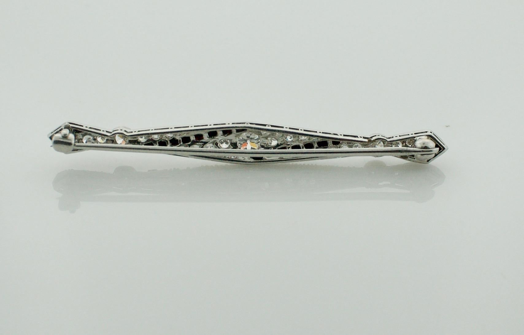 Extreme Art Deco Diamond and French Cut Onyx Brooch, circa 1920s in Platinum In Excellent Condition For Sale In Wailea, HI