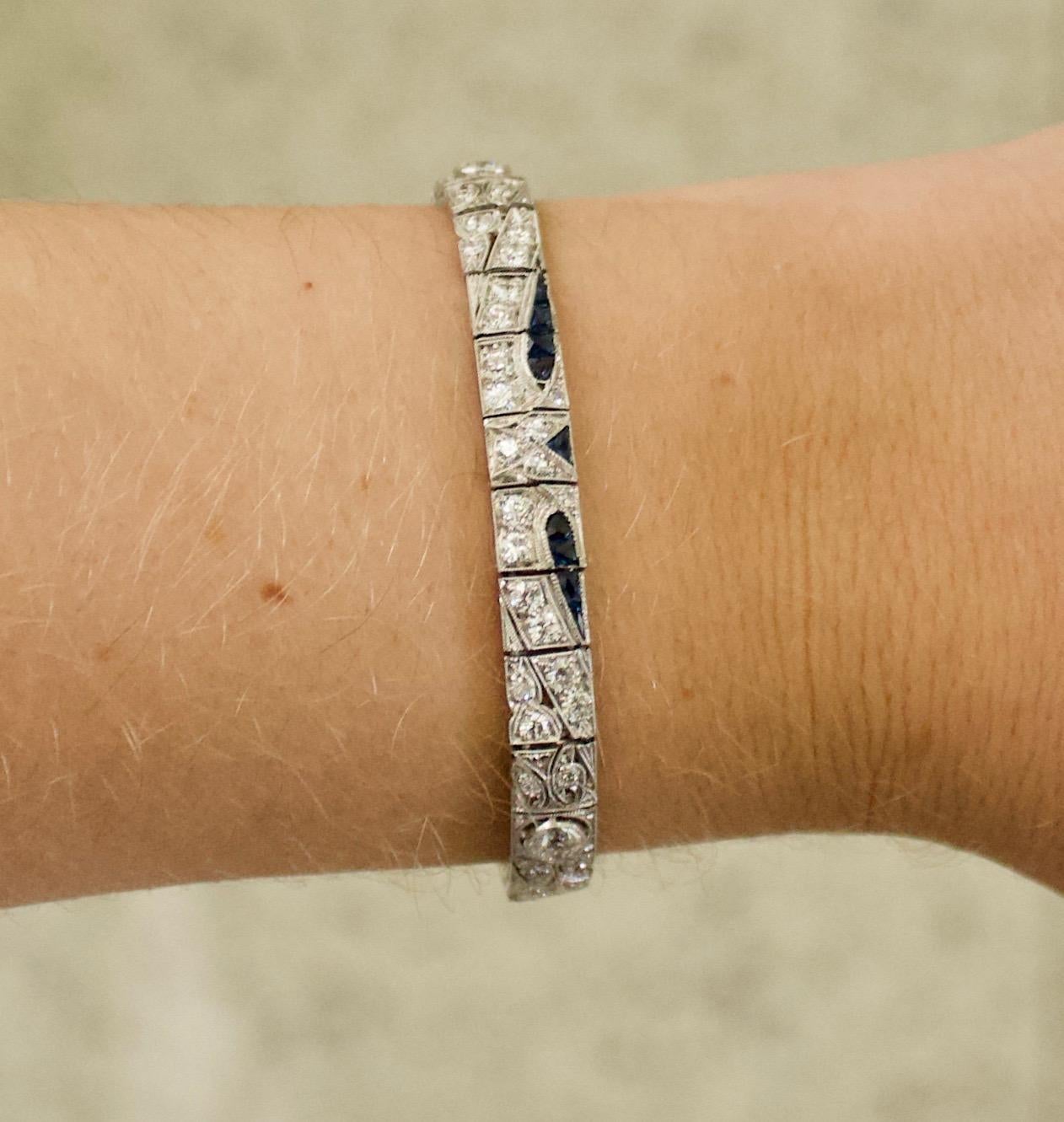 Art Deco Diamond and Sapphire Bracelet in Platinum Circa 1920's
Three Old European Cut Diamonds Weighing .90 Carats Approximately 
Seventy Eight Old European Cut Diamonds Weighing 3.15 Carats Approximately 
Twenty Seven fancy cut Sapphires  Weighing