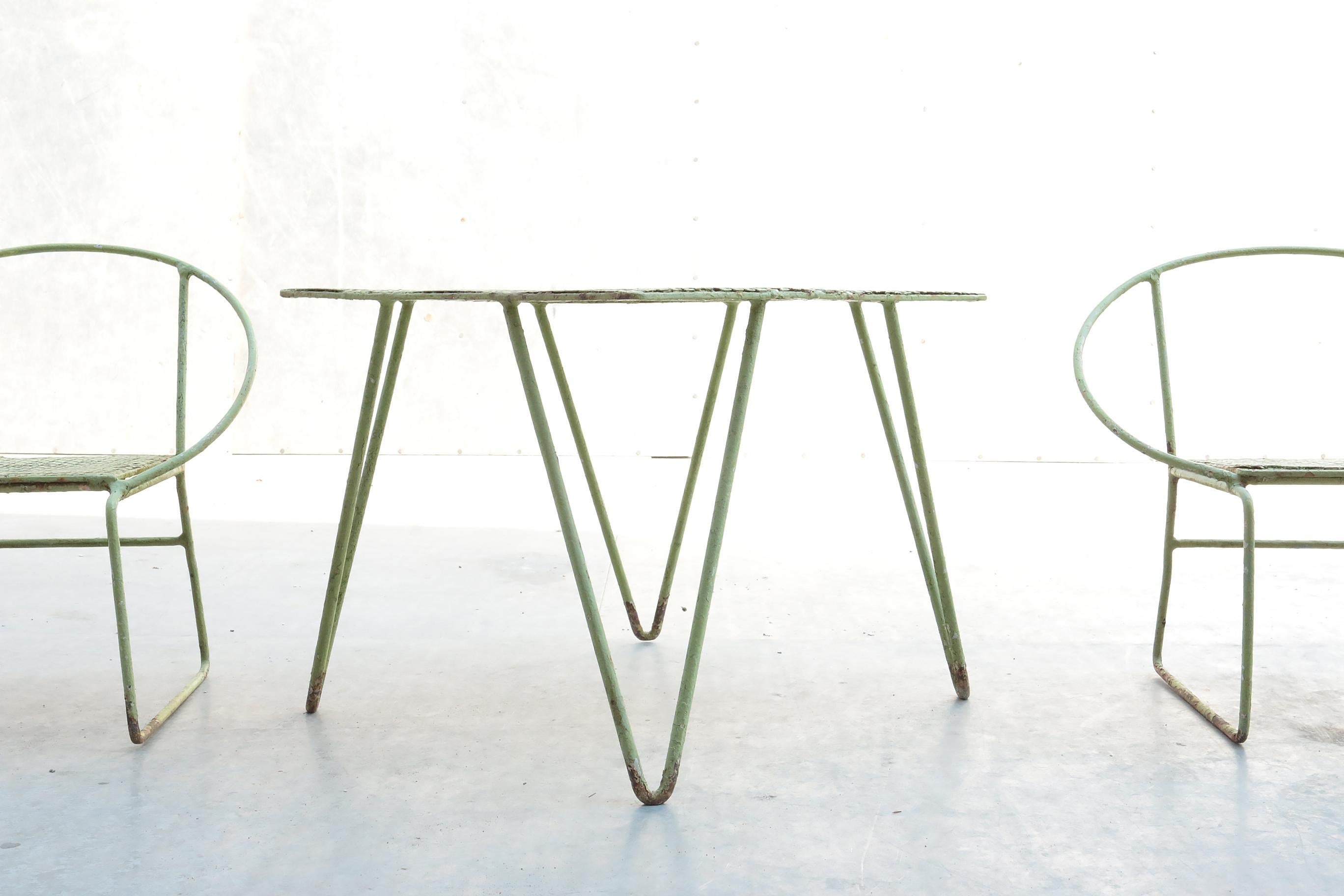 Really nice children set of two chairs and one table by Mathieu Mategot?
This set is not described as 