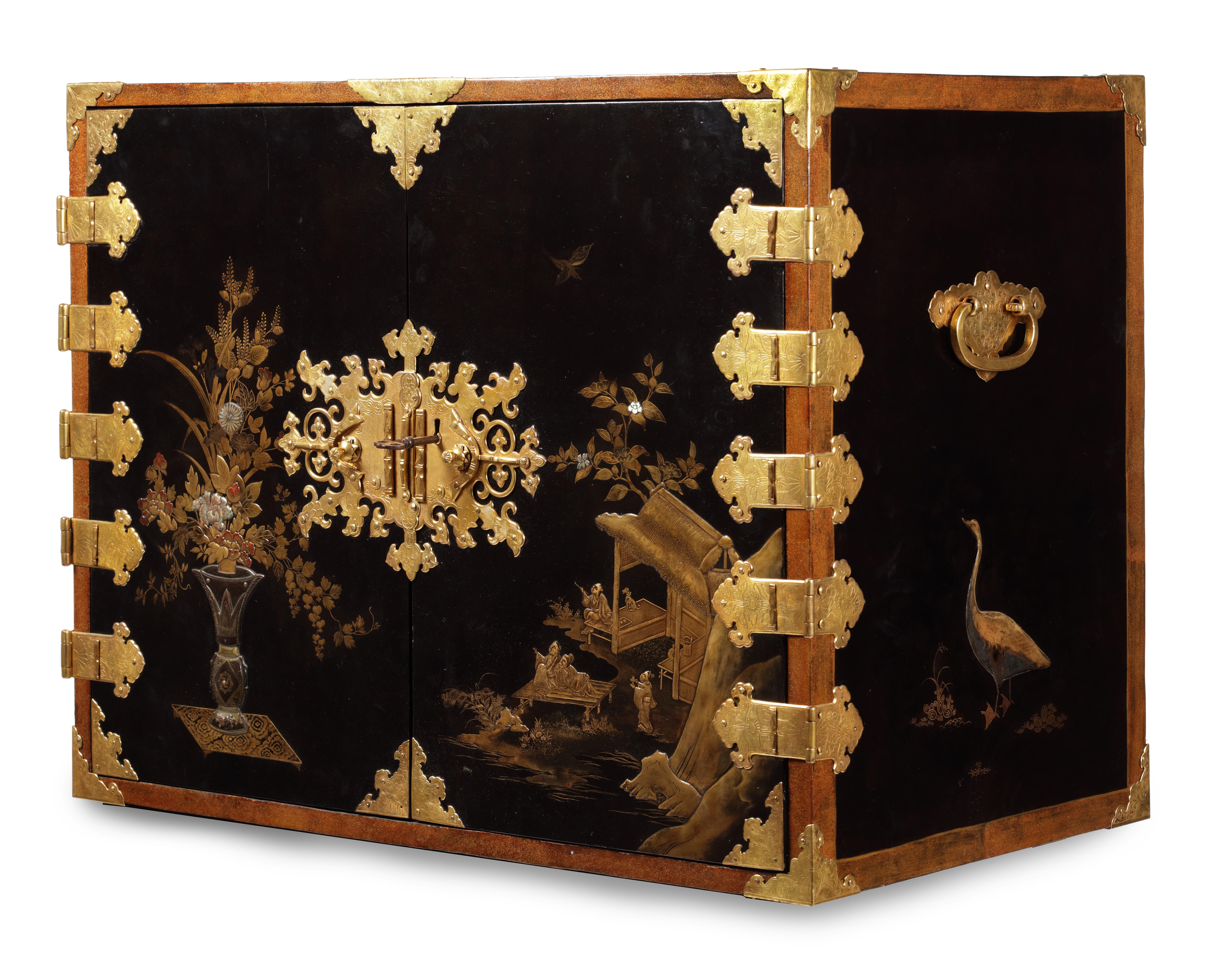 An extremely fine and important Japanese lacquer cabinet with gilt-copper mounts for the European market

Edo period, late 17th century

The pictorial style decorated rectangular cabinet in black lacquer decorated in gold, silver, red and brown