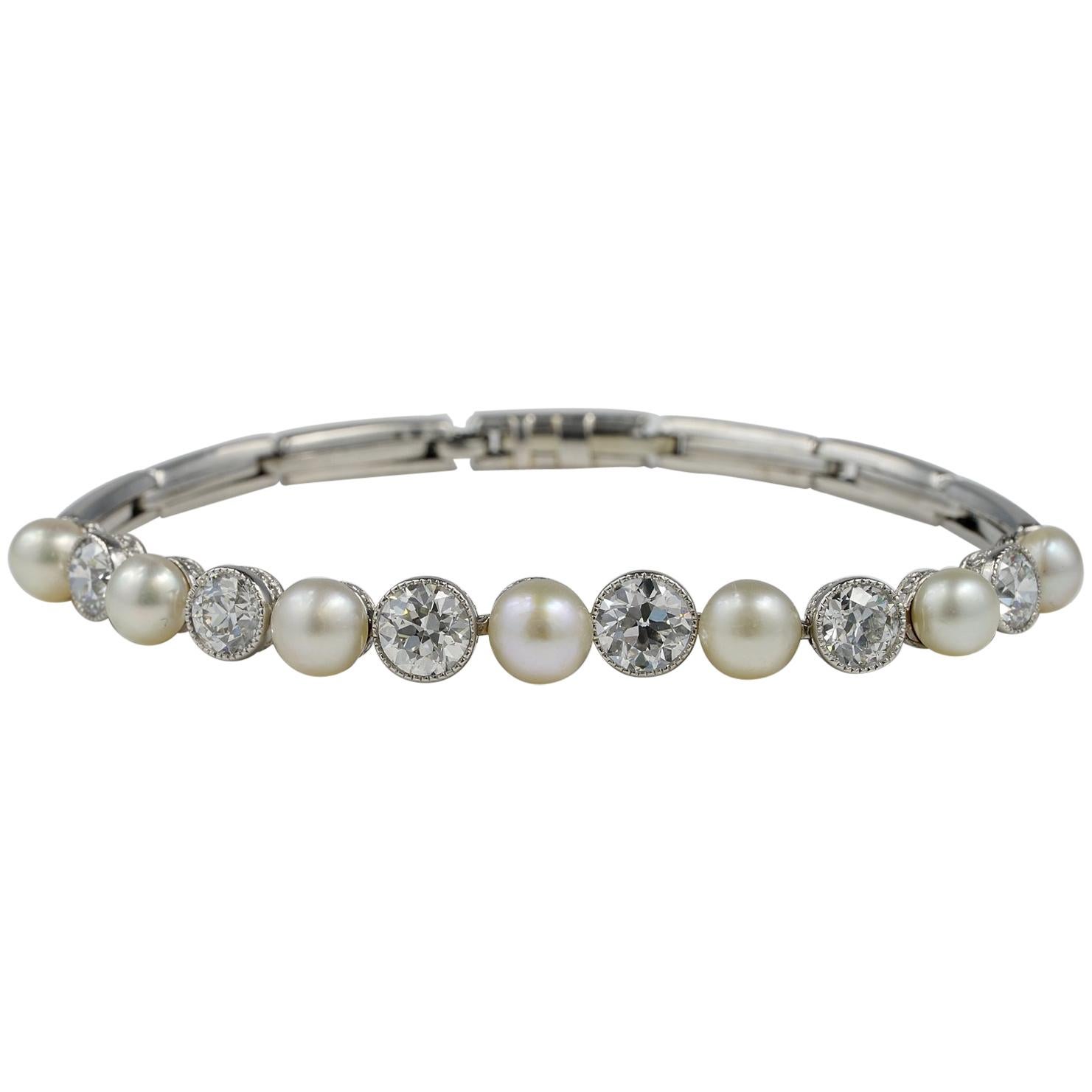 Extremely Fine Edwardian Natural Pearl Diamond Platinum Riviere Bracelet For Sale