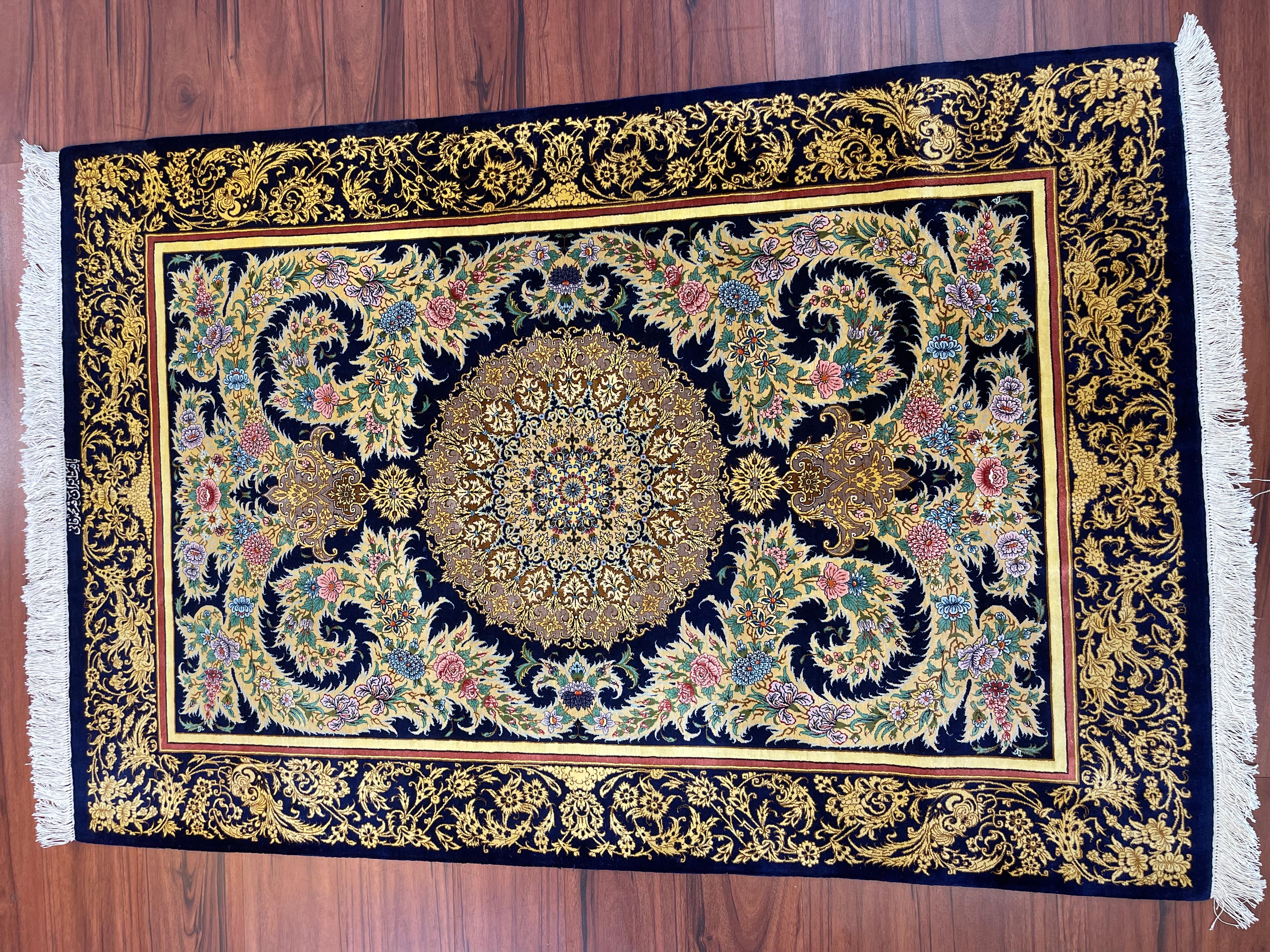A stunning Extremely Fine Persian Silk Qum Rug. This beautiful 100% silk rug originates from Iran in the late 20th century and is in excellent condition. 