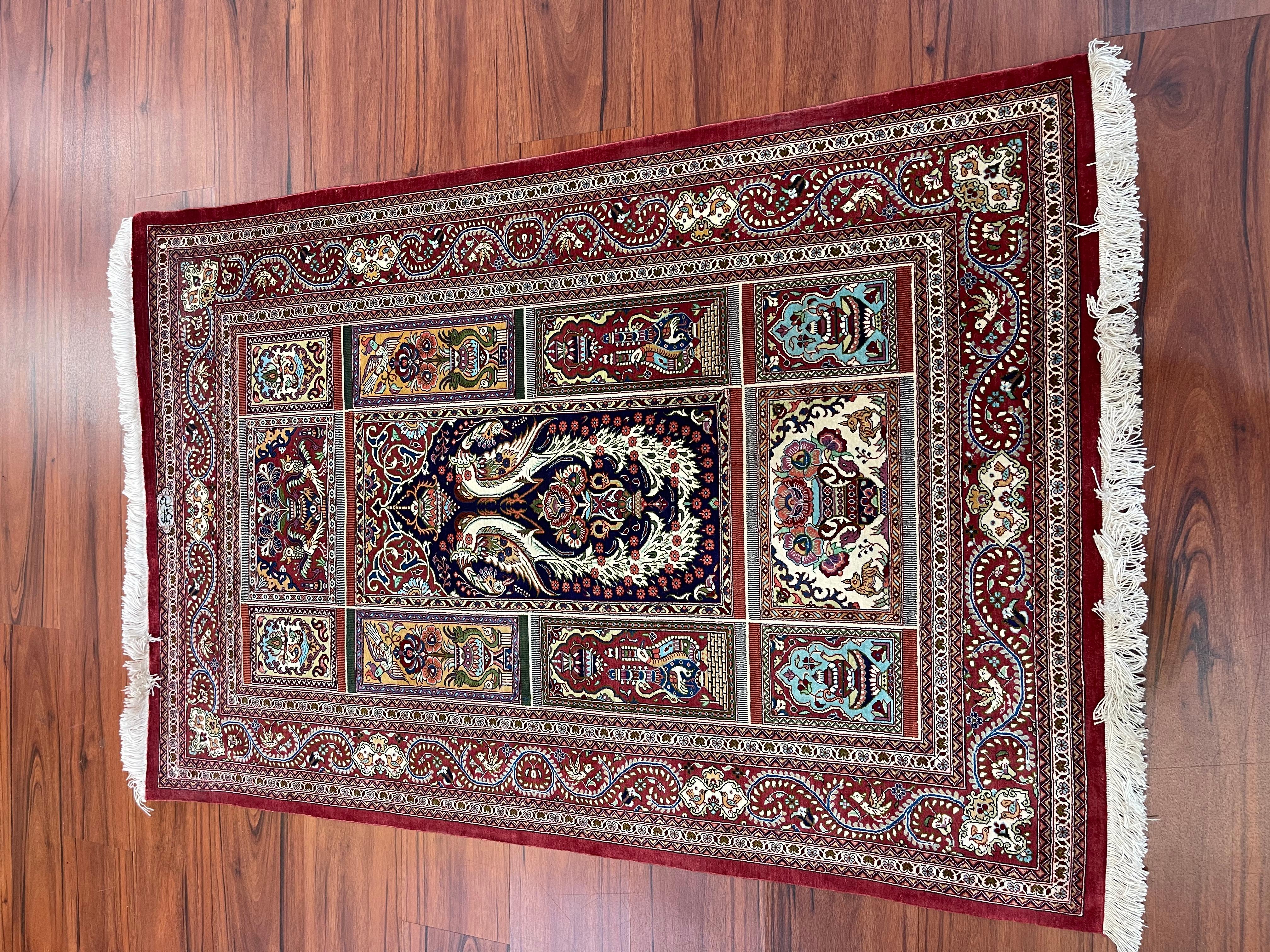 A stunning Extremely Fine Persian Silk Qum Rug. This beautiful 100% silk Rug originates from Iran in the late 20th century and is in excellent condition. 