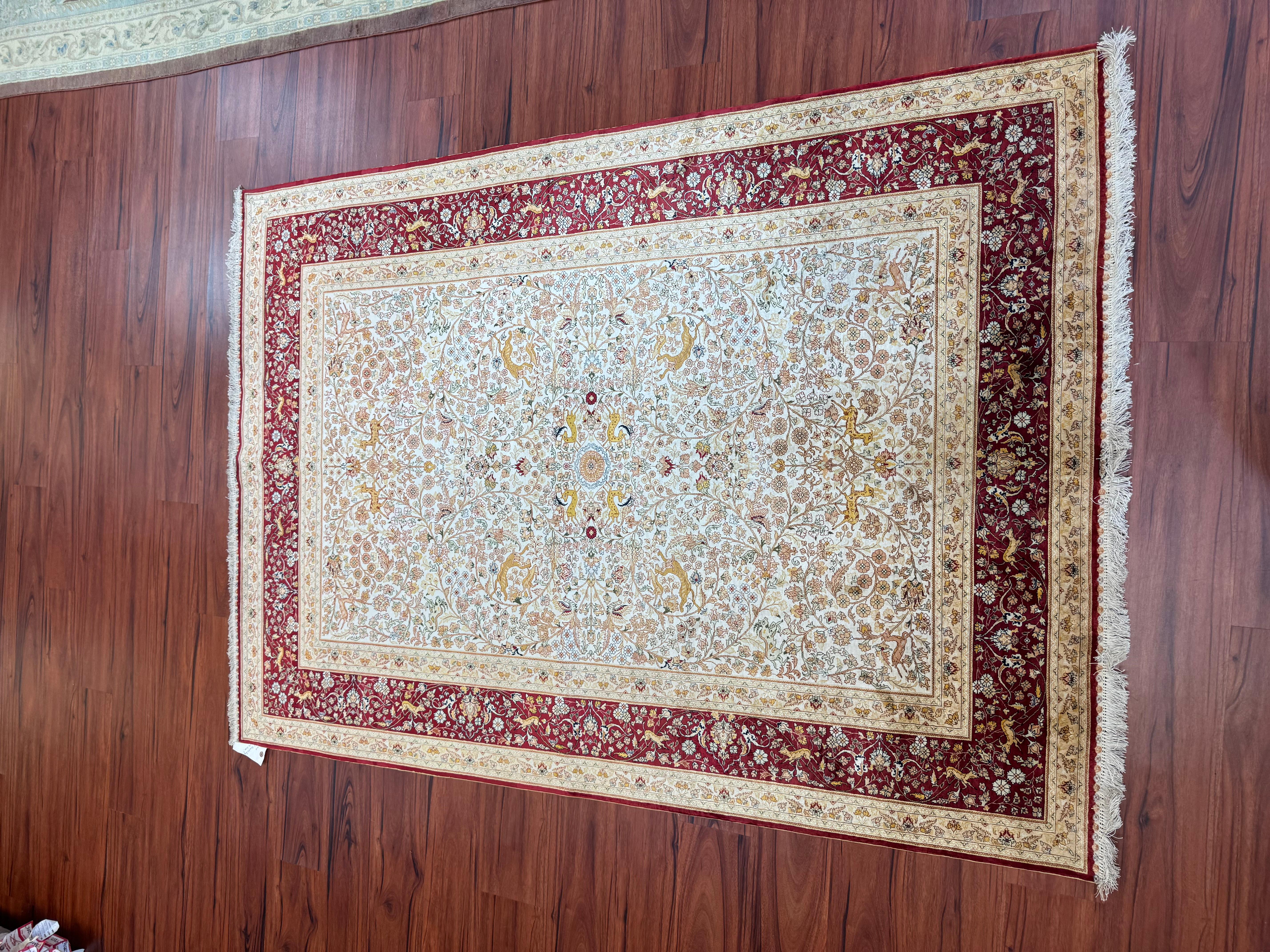 A stunning Extremly Fine Turkish Hereke Rug that originates from turkey in the late 20th century. This rug is in excellent condition and is truly beautiful. It is made from 100% silk and has a gorgeous color combination to match its design!