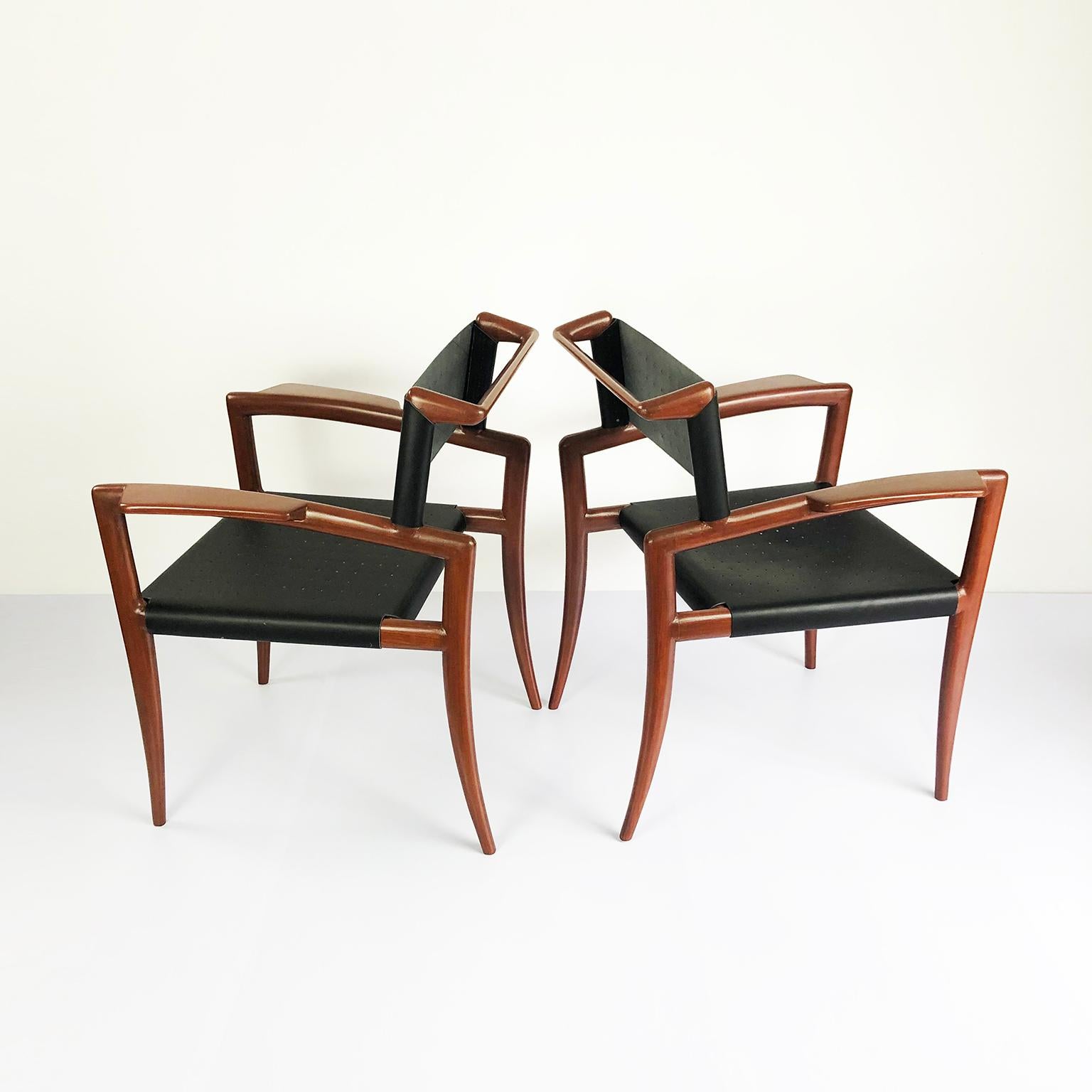 We offer this extremely rare pair of sculptural klismos armchairs designed by Charles Allen for Regil de Yucatan in 1952, recently refinished and reupholstered with new black leather matching the original design.