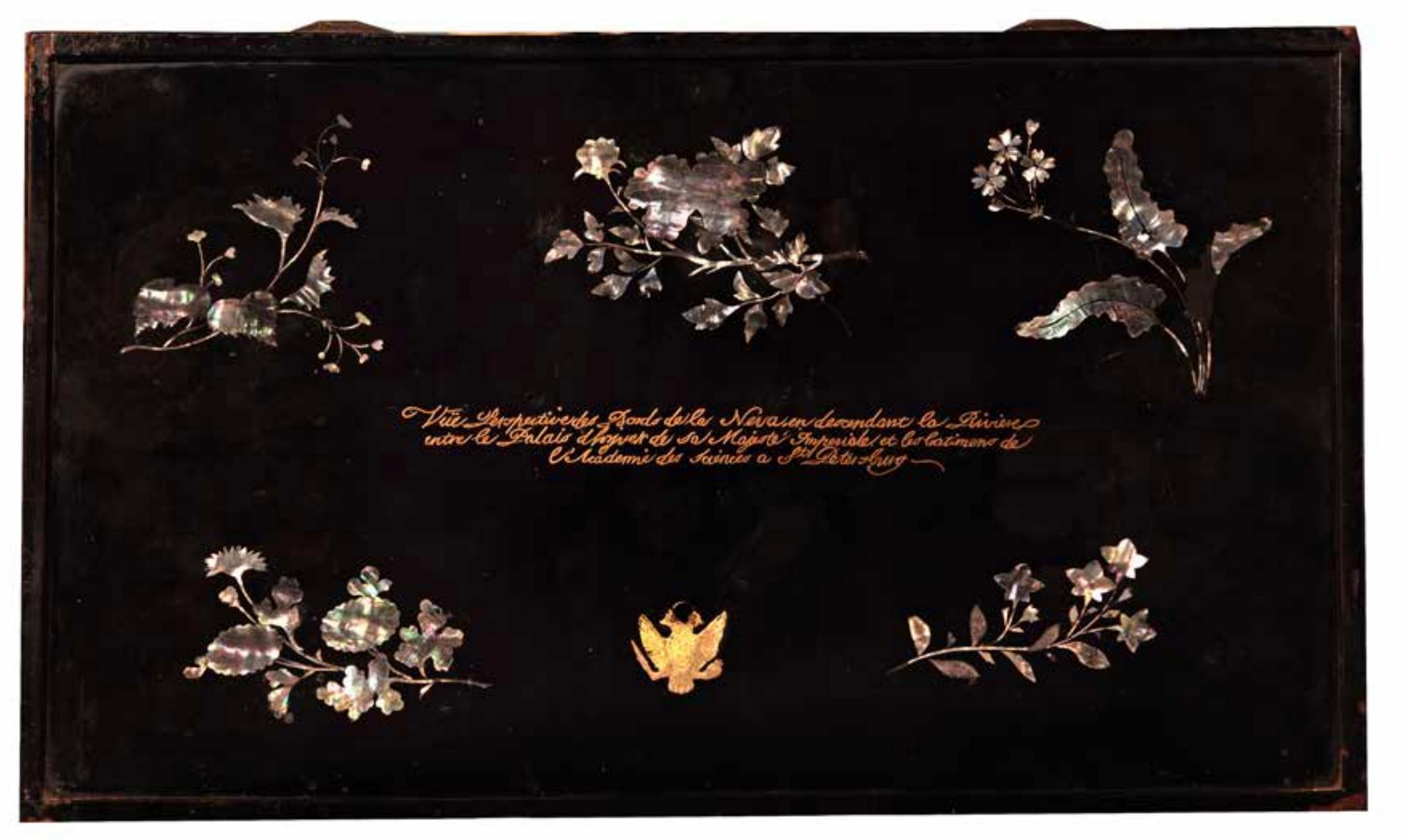 An important Japanese lacquer Maki-É Panel Depicting St. Petersburg on the River Neva, with the winter palace on the left and the academy of science on the right, 18th century.

Nagasaki, 1780-1800

In black lacquer on copper, the front