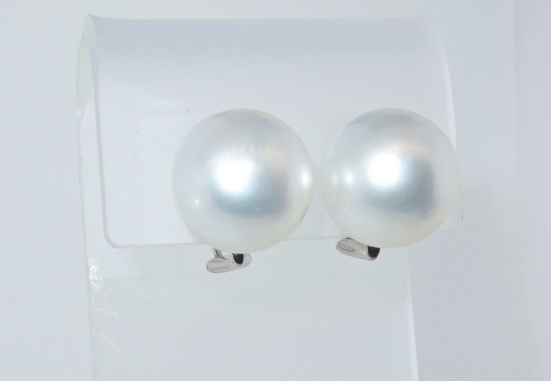 South Sea pearl earrings of very fine quality and extremely large - 17.9 and 18.0 mm.  Sometimes referred to triple A quality, these smooth skin, white even color, no pitting and round and makes these matched pair of South Sea Pearl earrings very