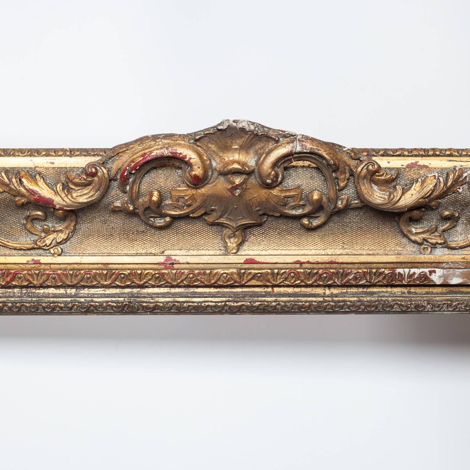 Extremely large gilt and gesso frame, circa 1900. 

Some small losses throughout the frame. 

Measures: 231cm high x 180cm wide x 8cm deep.