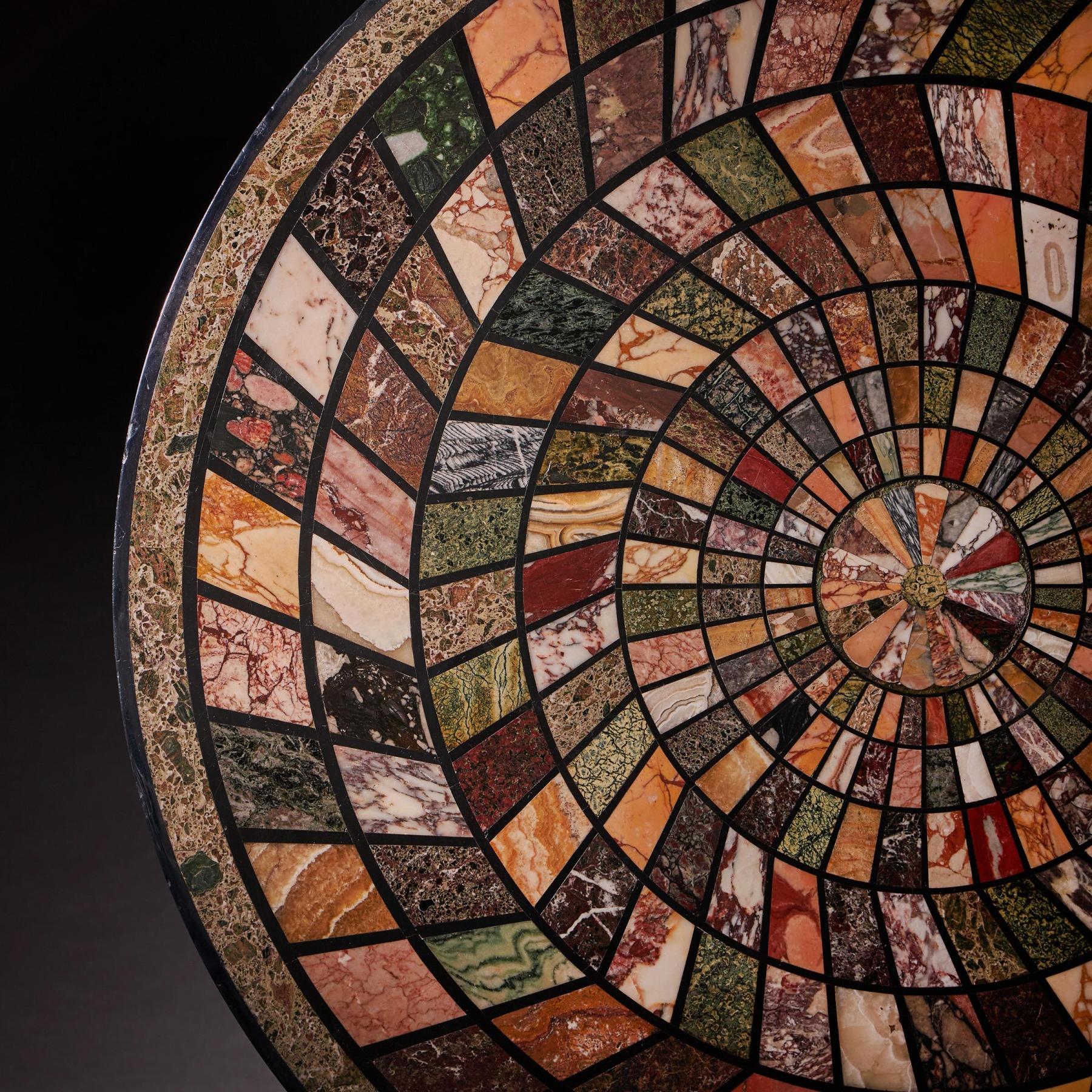 An extremely large mid 19th Century grand tour specimen marble top with rare and fine marble and hardstone examples. 



Italy Rome Circa 1840- 1860



Inlaid with concentric rings of chevron-shaped marbles including: brocatelle, verde antico,