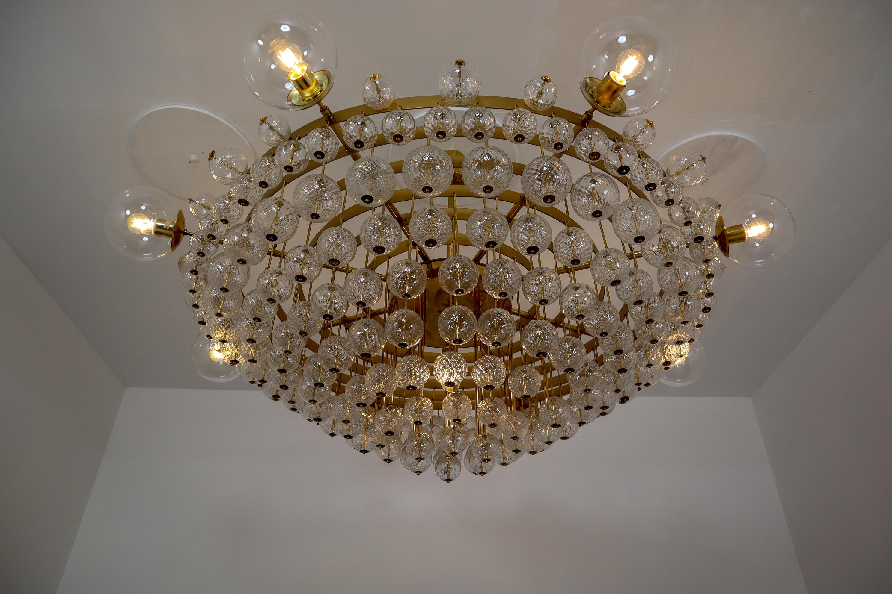 Extremely Large Hotel Chandelier with Brass Fixture and Structured Glass Globes 3