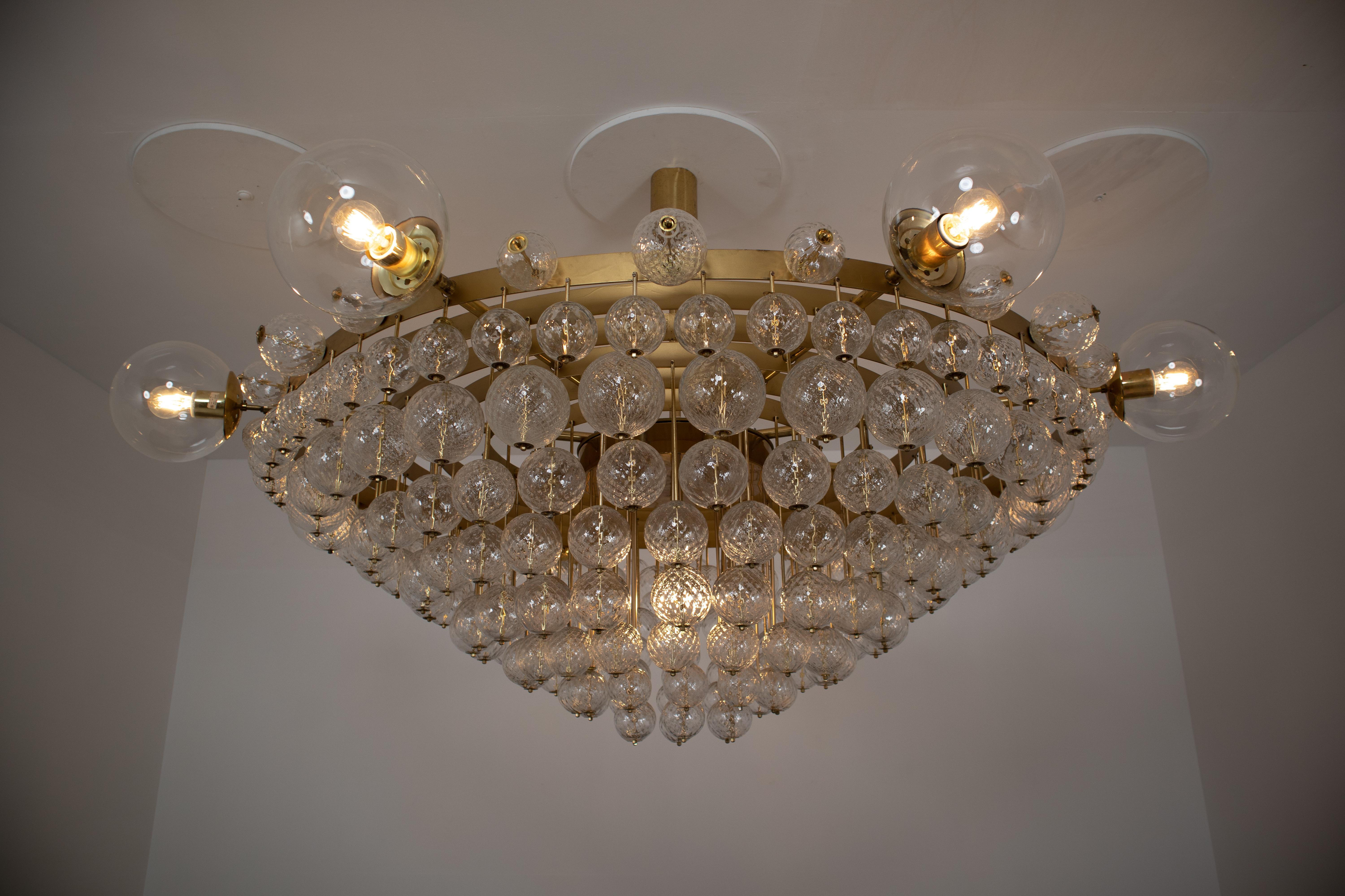 Extremely Large Hotel Chandelier with Brass Fixture and Structured Glass Globes 7