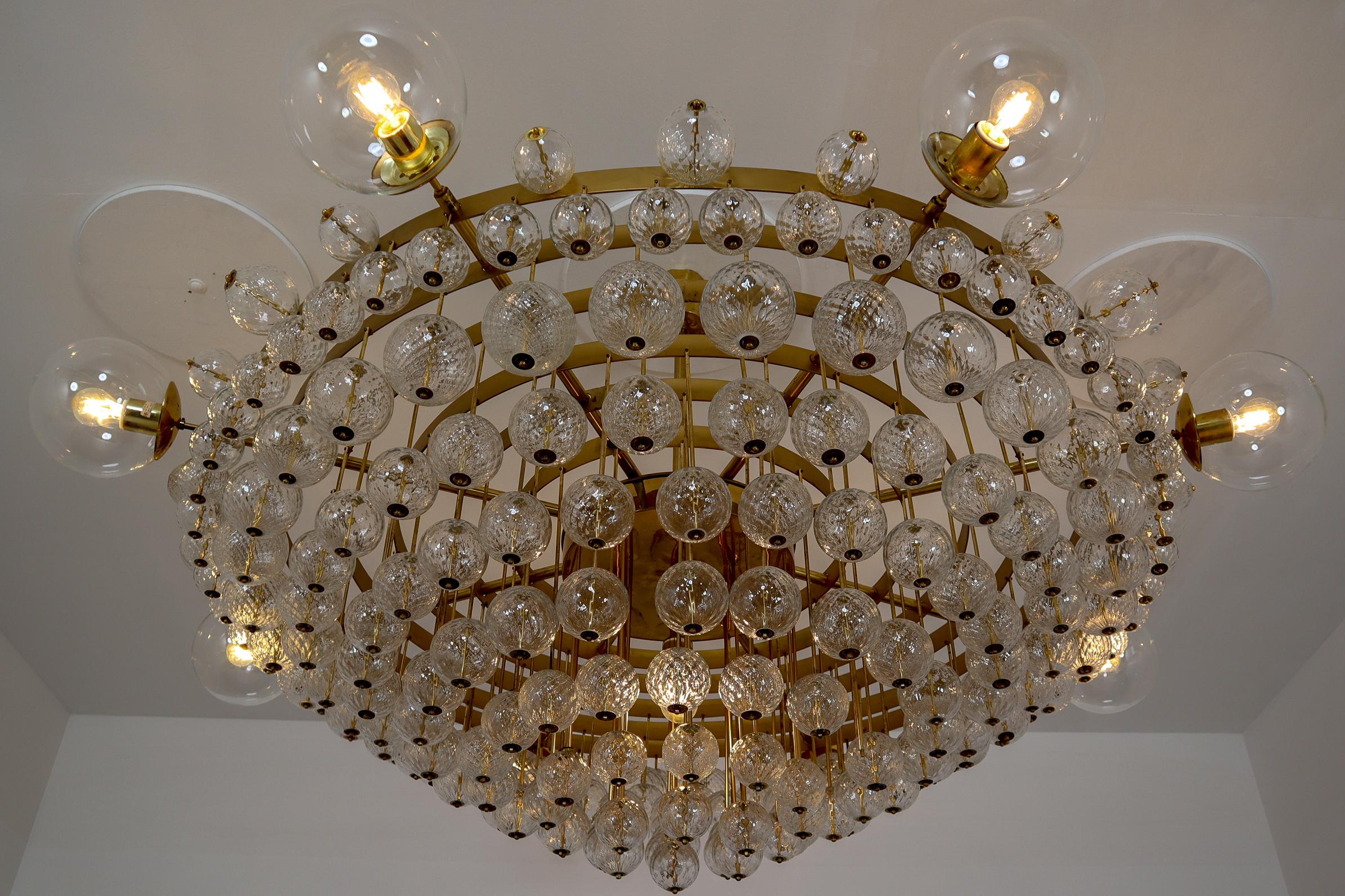 20th Century Extremely Large Hotel Chandelier with Brass Fixture and Structured Glass Globes